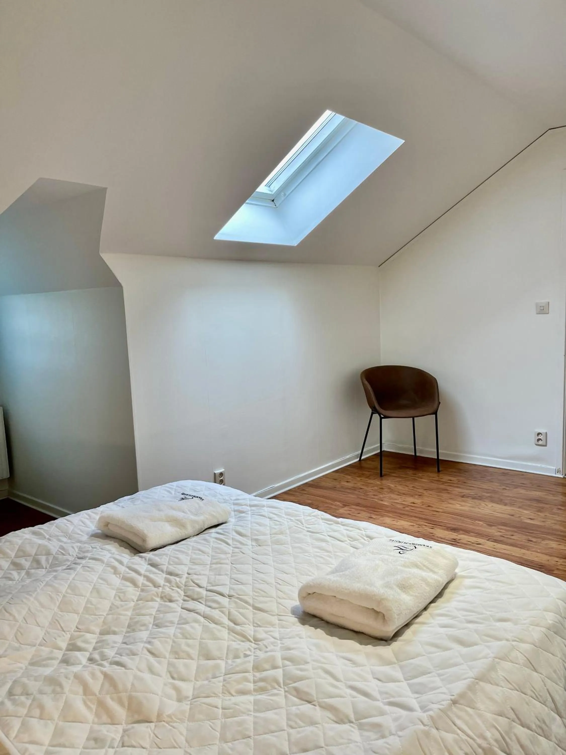 Bed in Säffle Suites by Svaneholm Hotel