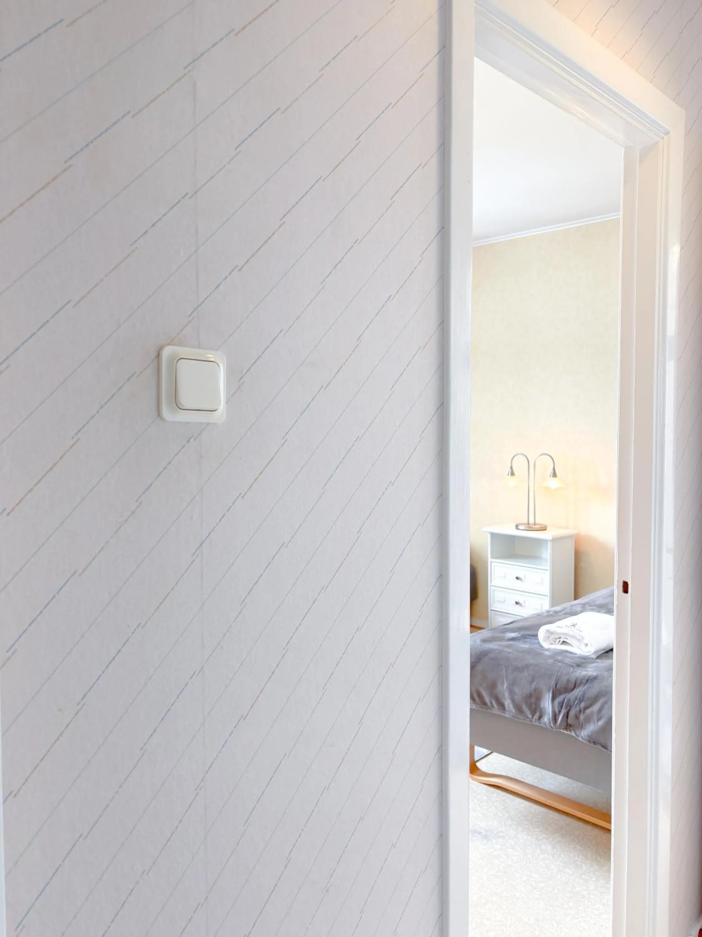 Bed in Säffle Suites by Svaneholm Hotel