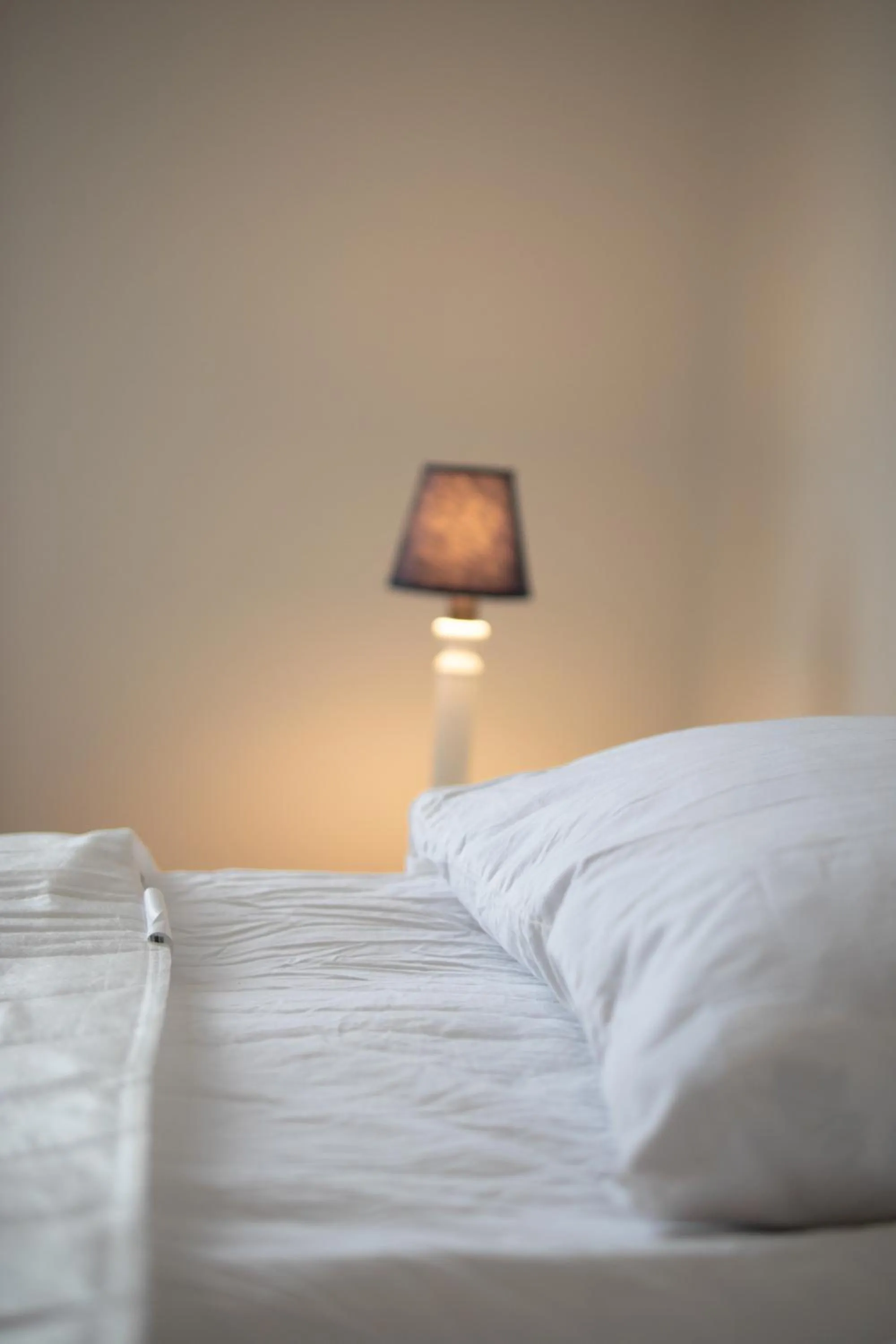 Bed in Säffle Suites by Svaneholm Hotel