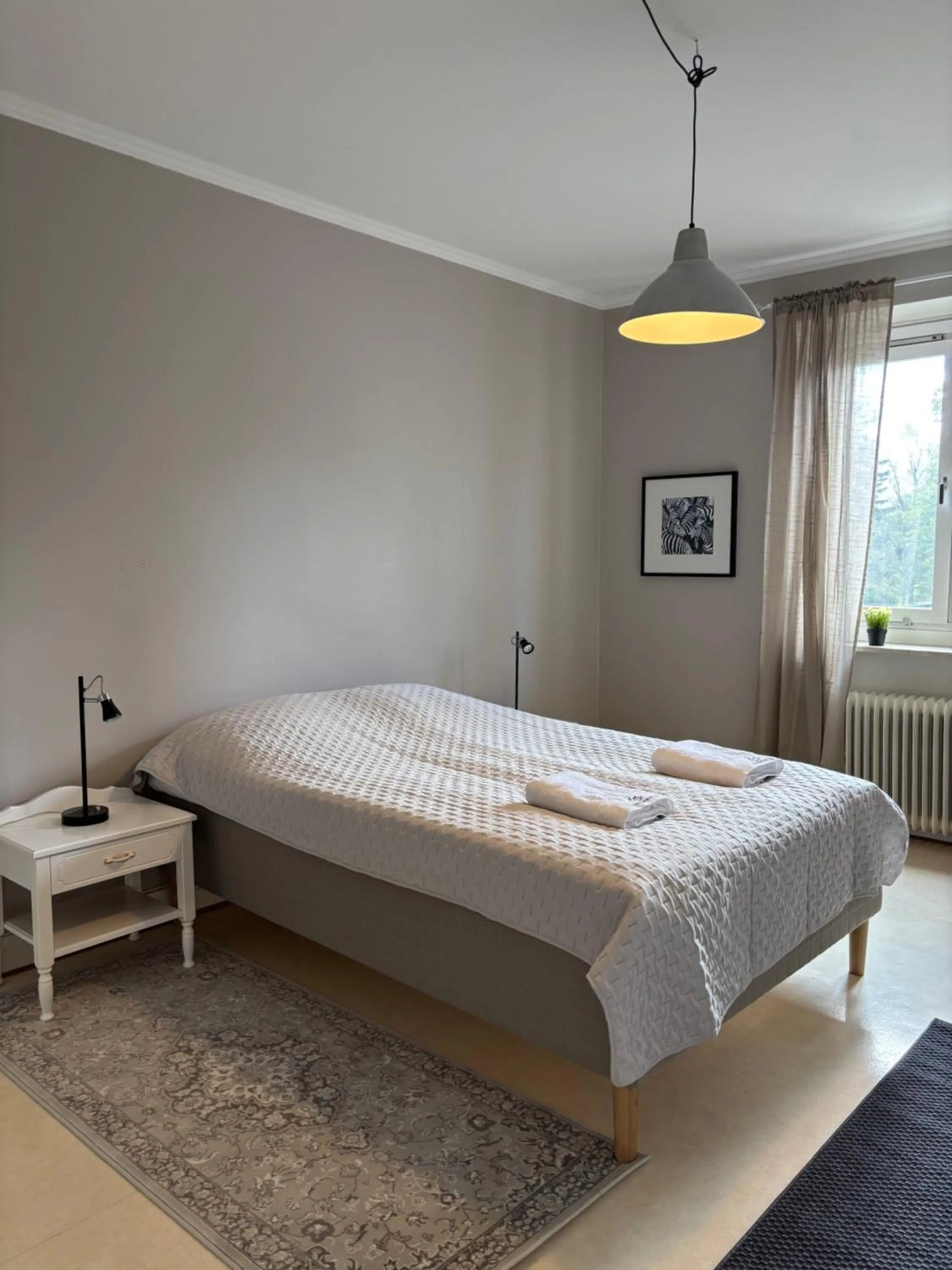 Bed in Säffle Suites by Svaneholm Hotel