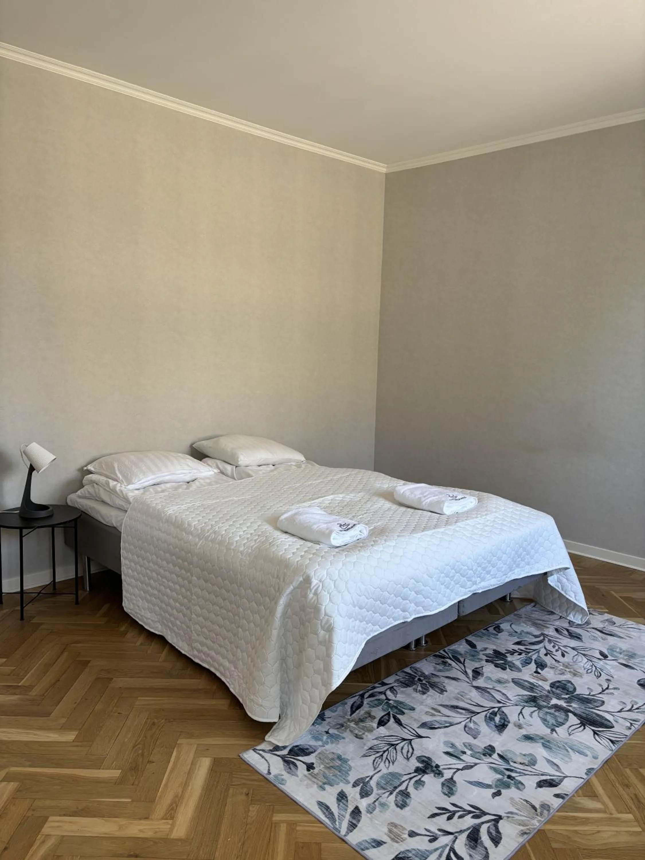 Bed in Säffle Suites by Svaneholm Hotel