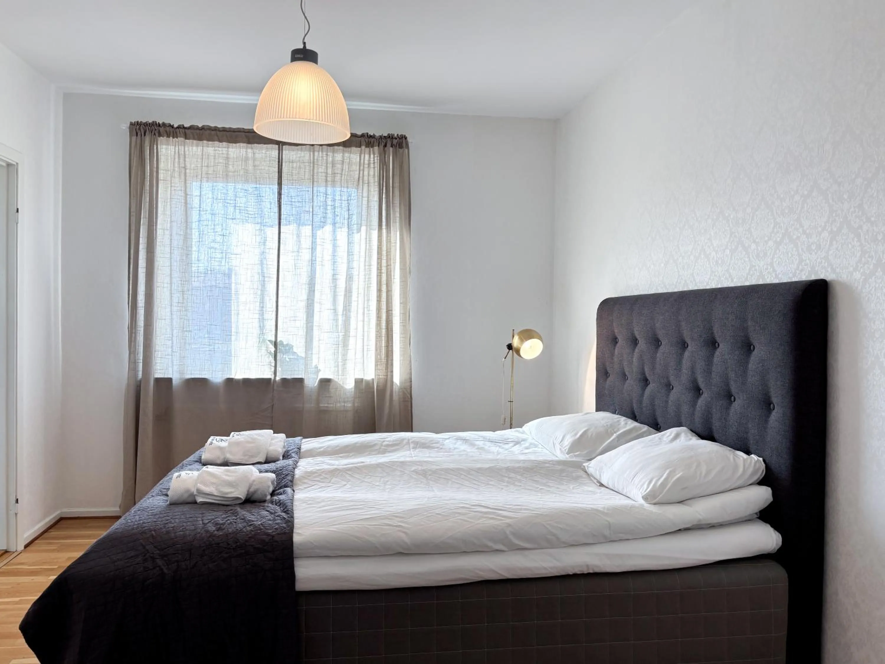 Bed in Säffle Suites by Svaneholm Hotel