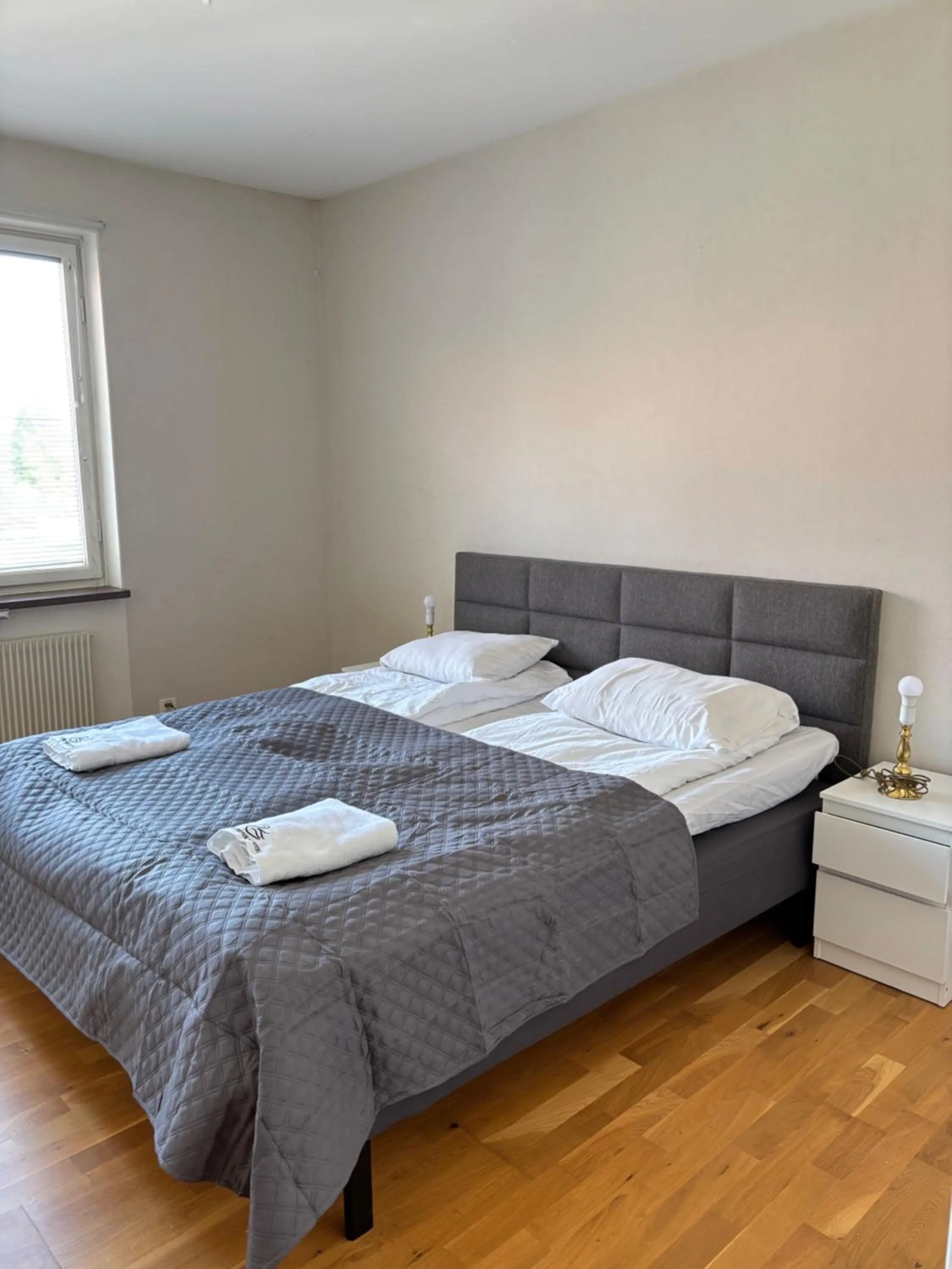 Bed in Säffle Suites by Svaneholm Hotel