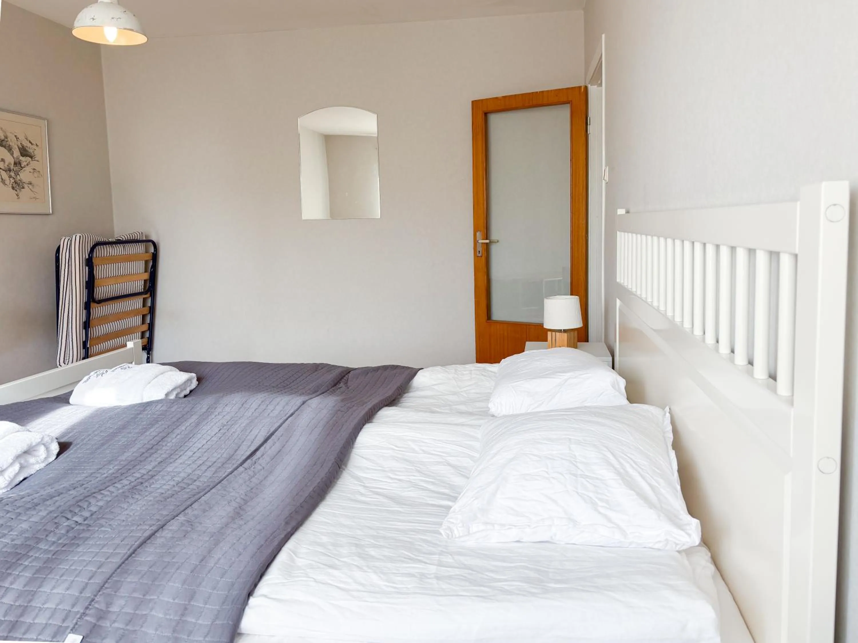 Bed in Säffle Suites by Svaneholm Hotel