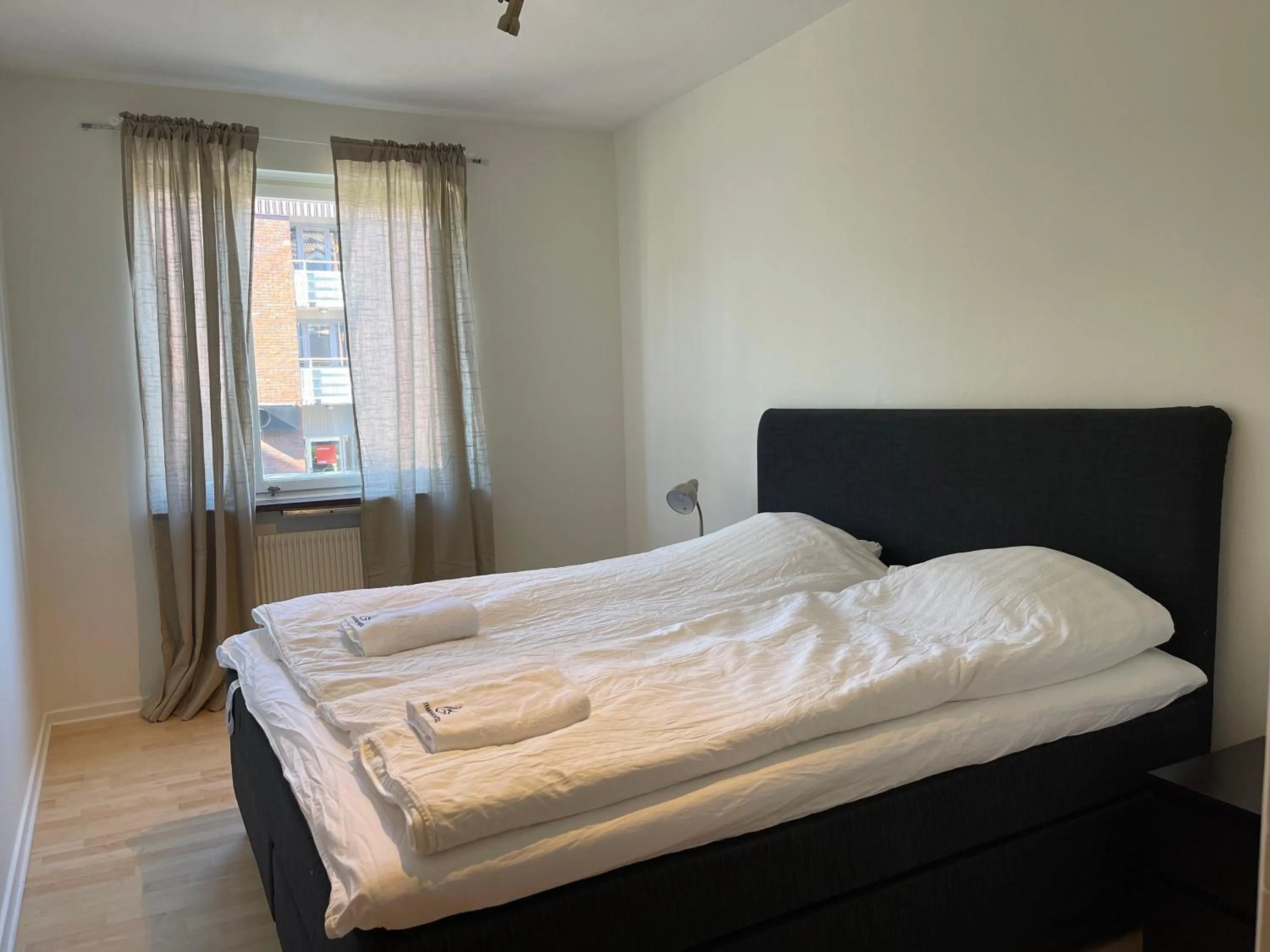 Bed in Säffle Suites by Svaneholm Hotel