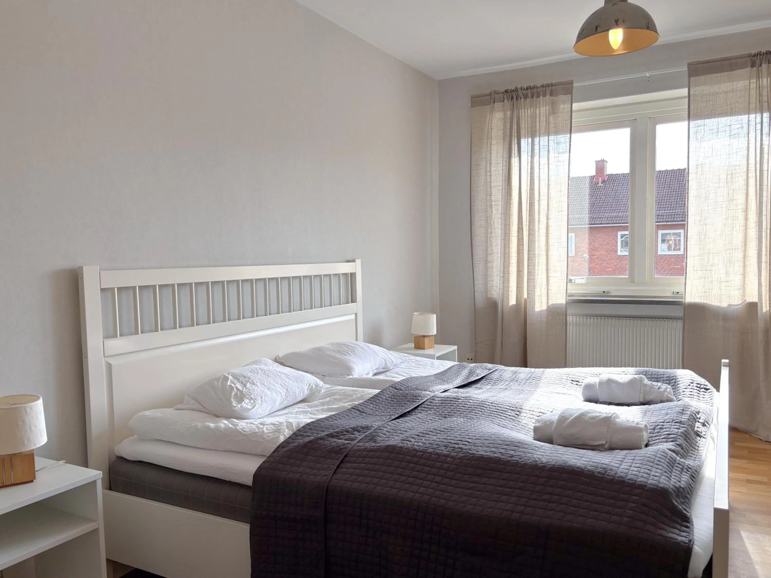 Bed in Säffle Suites by Svaneholm Hotel