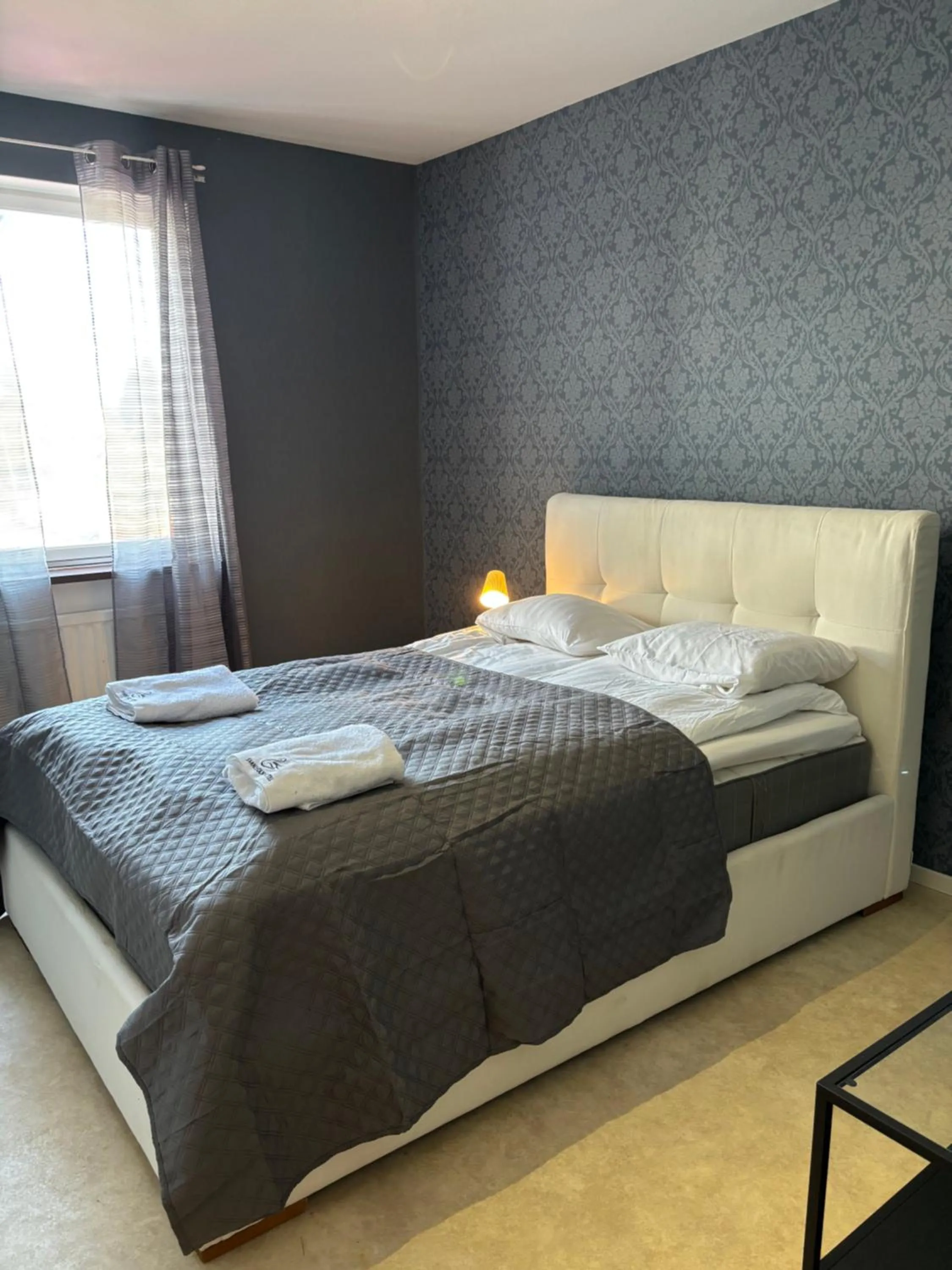 Bed in Säffle Suites by Svaneholm Hotel