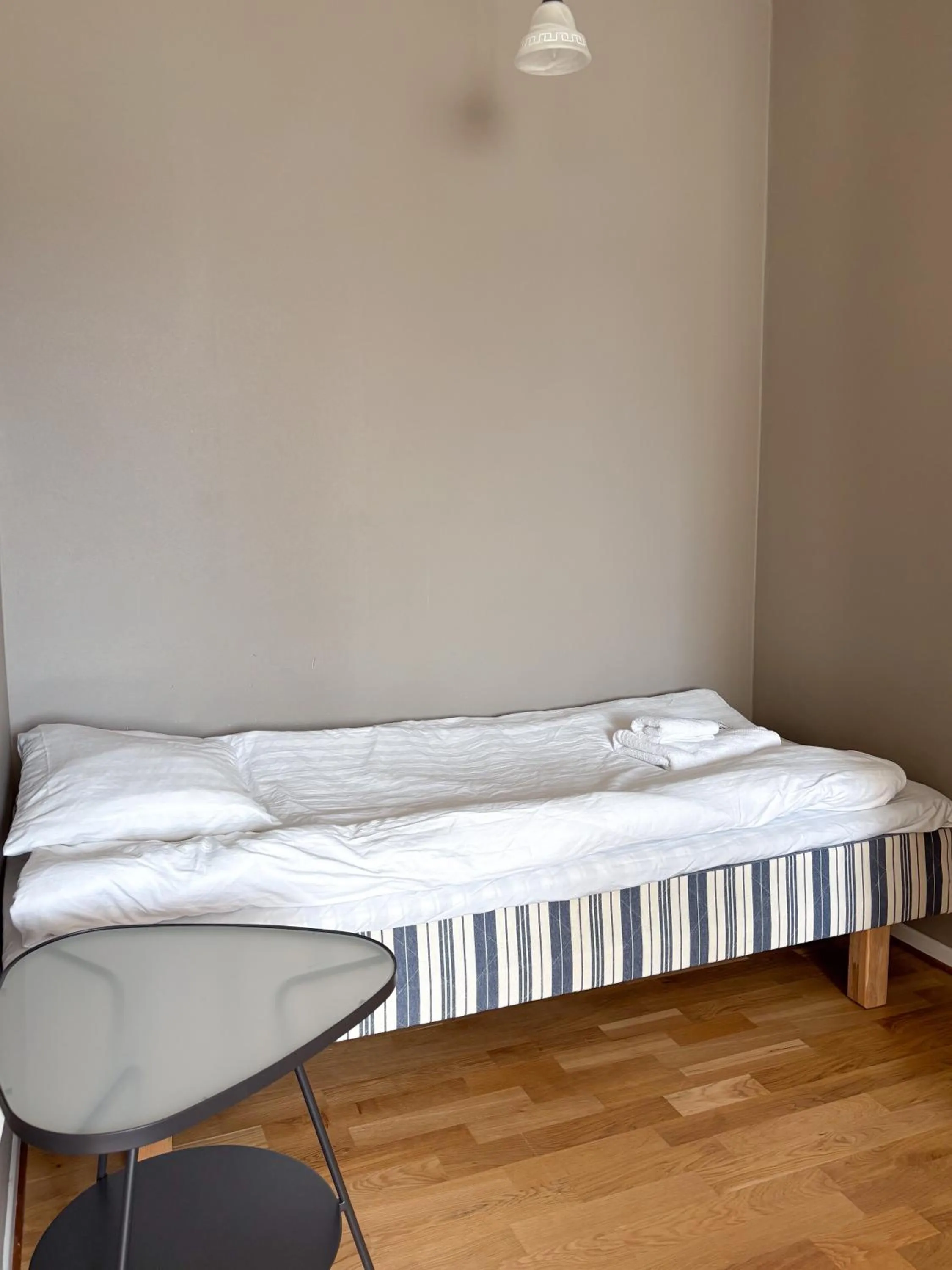 Bed in Säffle Suites by Svaneholm Hotel