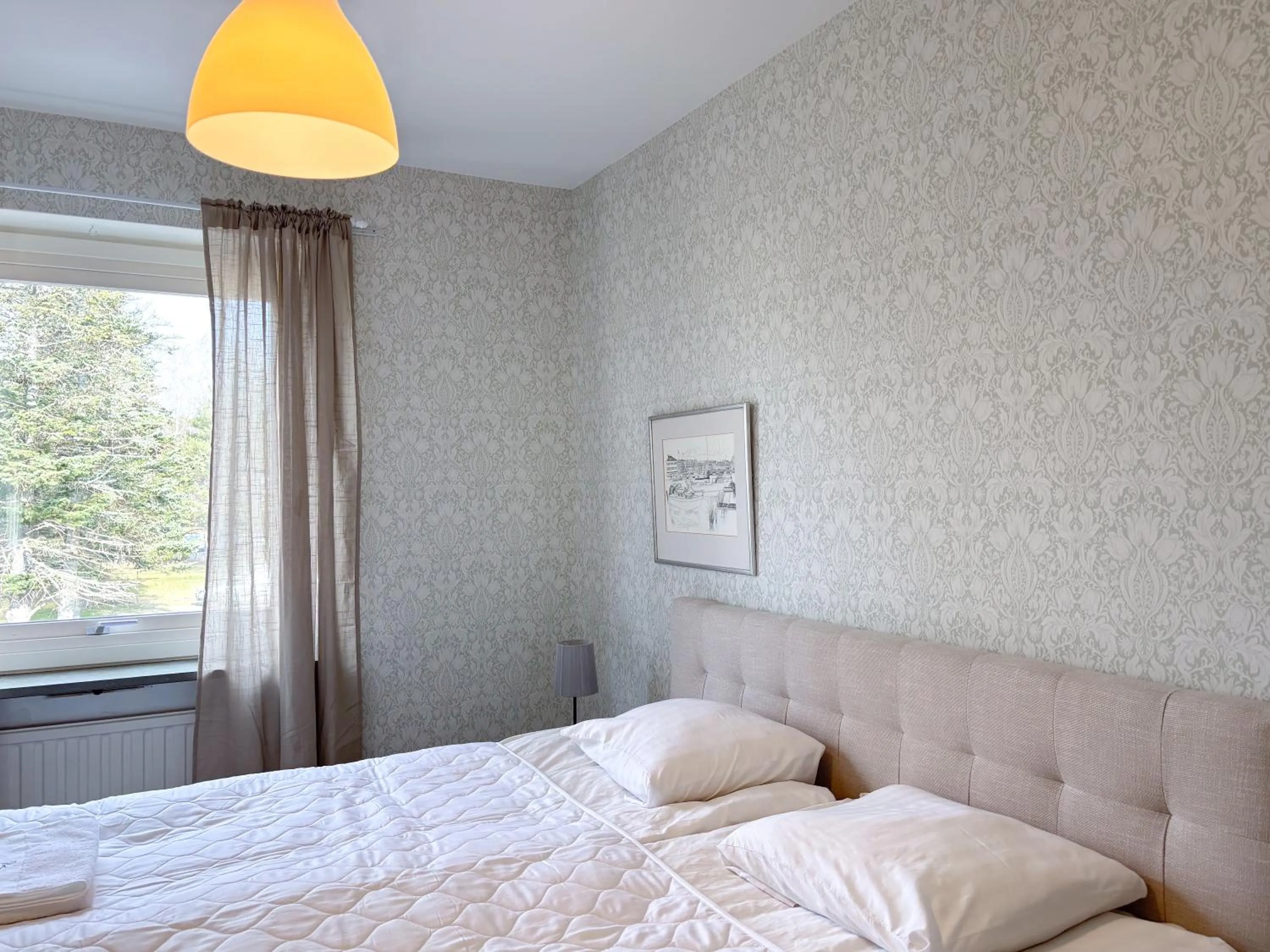 Bed in Säffle Suites by Svaneholm Hotel