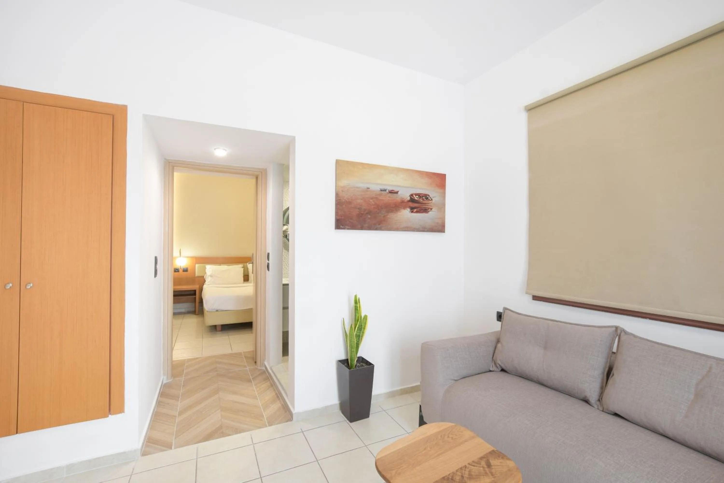 Living room, Bed in Georgia's Garden by Omilos Hotels