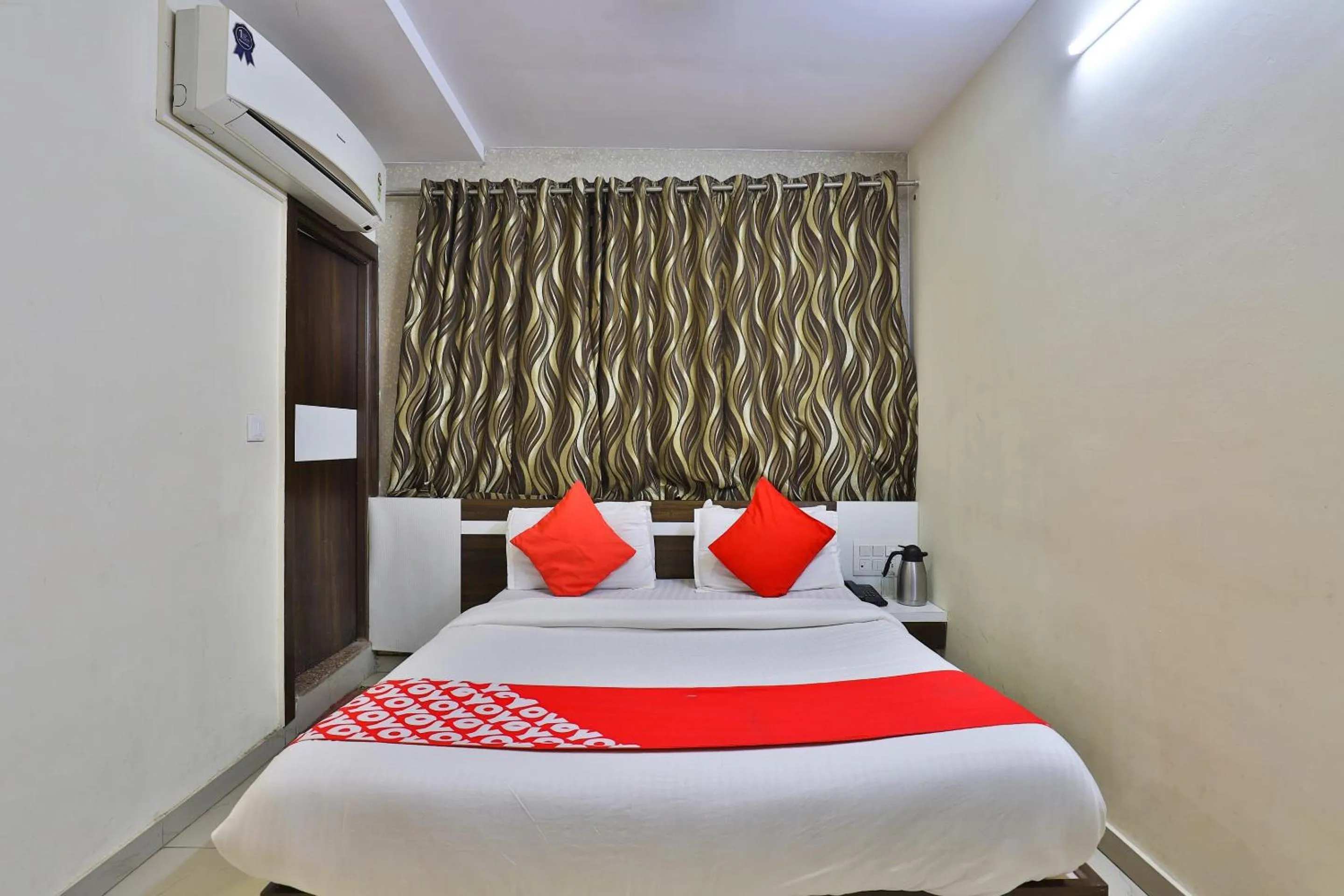 Bedroom in Hotel O Sri Balaji Residency