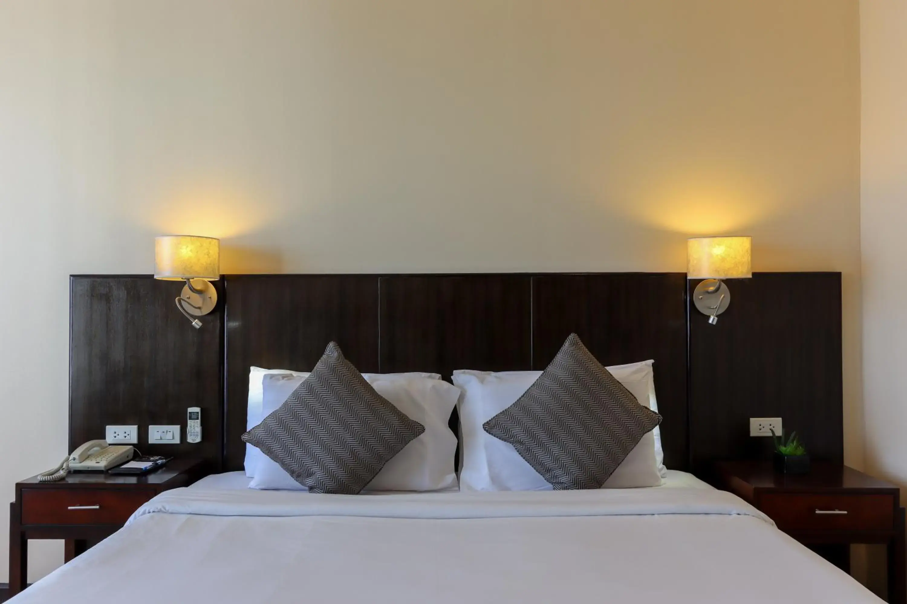 Bed in Paseo Premiere Hotel Bed in Paseo Premiere Hotel