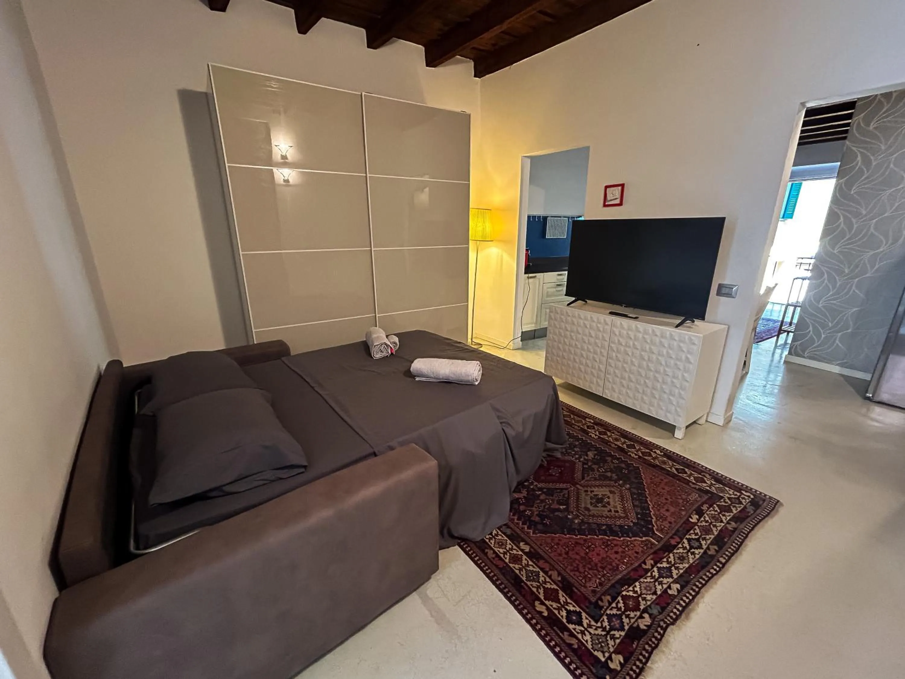 Communal lounge/ TV room in Dimora Storica nel Cuore di Bergamo