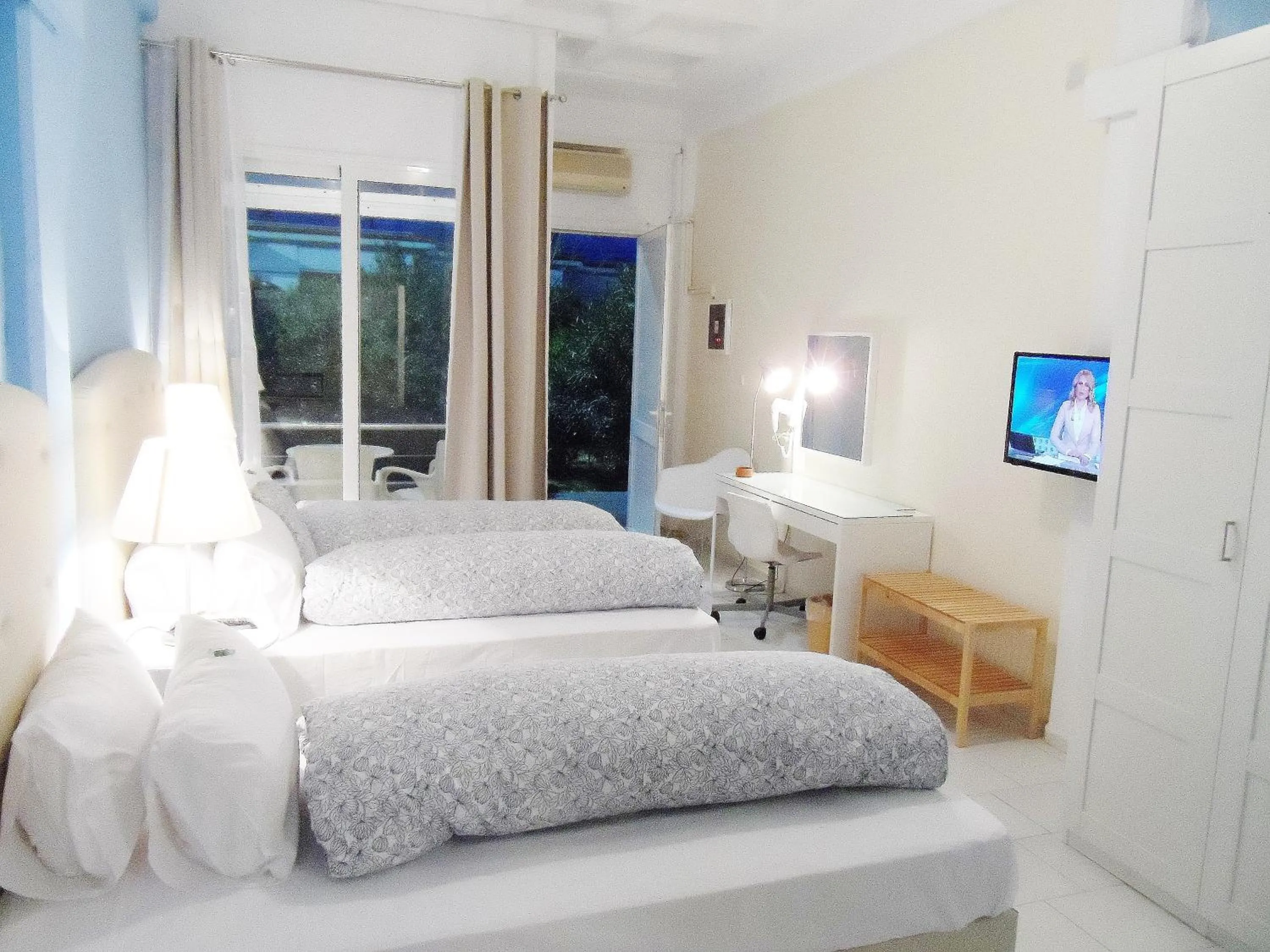 Bedroom, Bed in Homely Studios