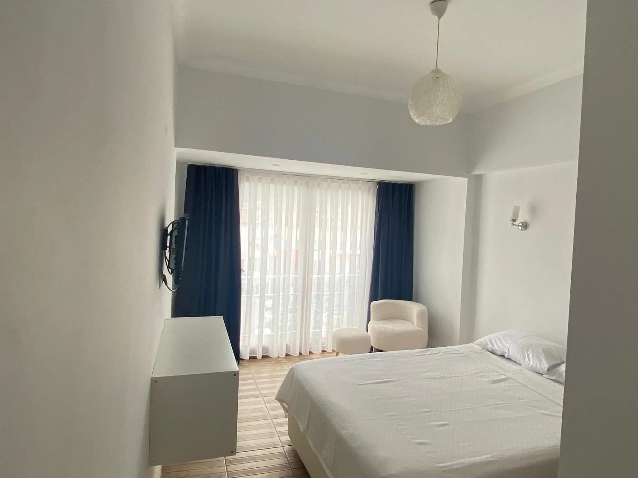 Bed in Bouvardia Inn