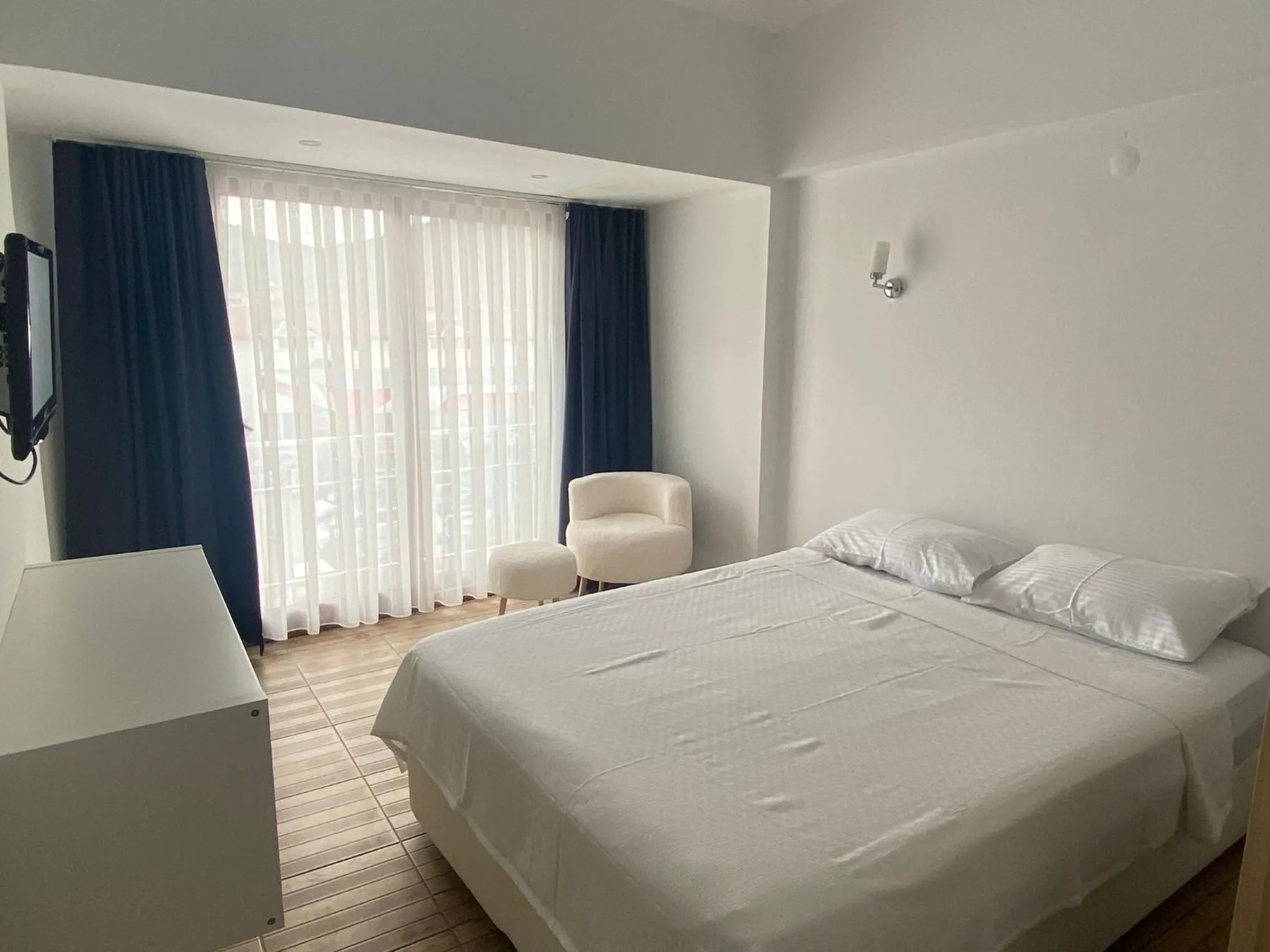 Bed in Bouvardia Inn