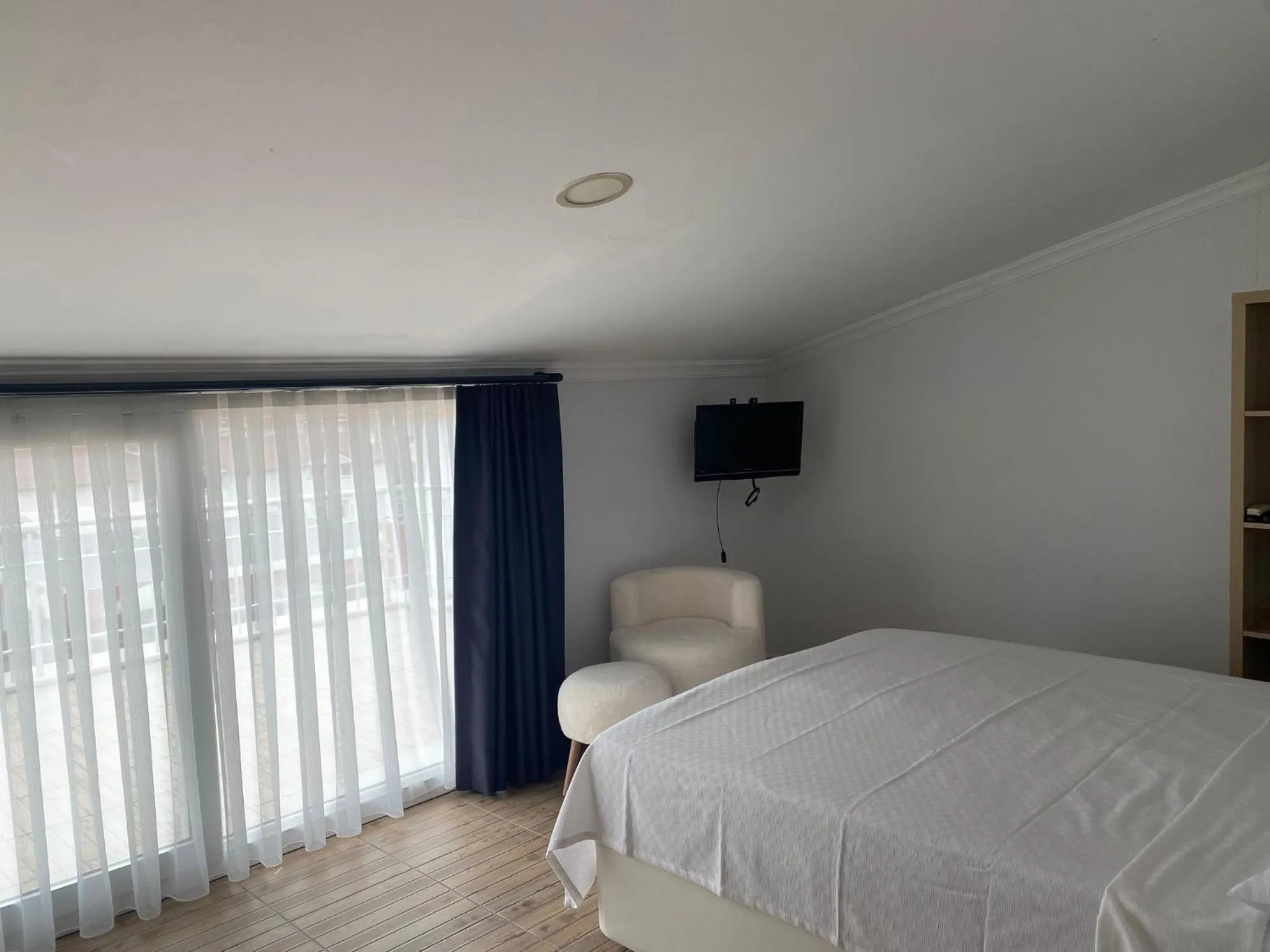 Bed in Bouvardia Inn