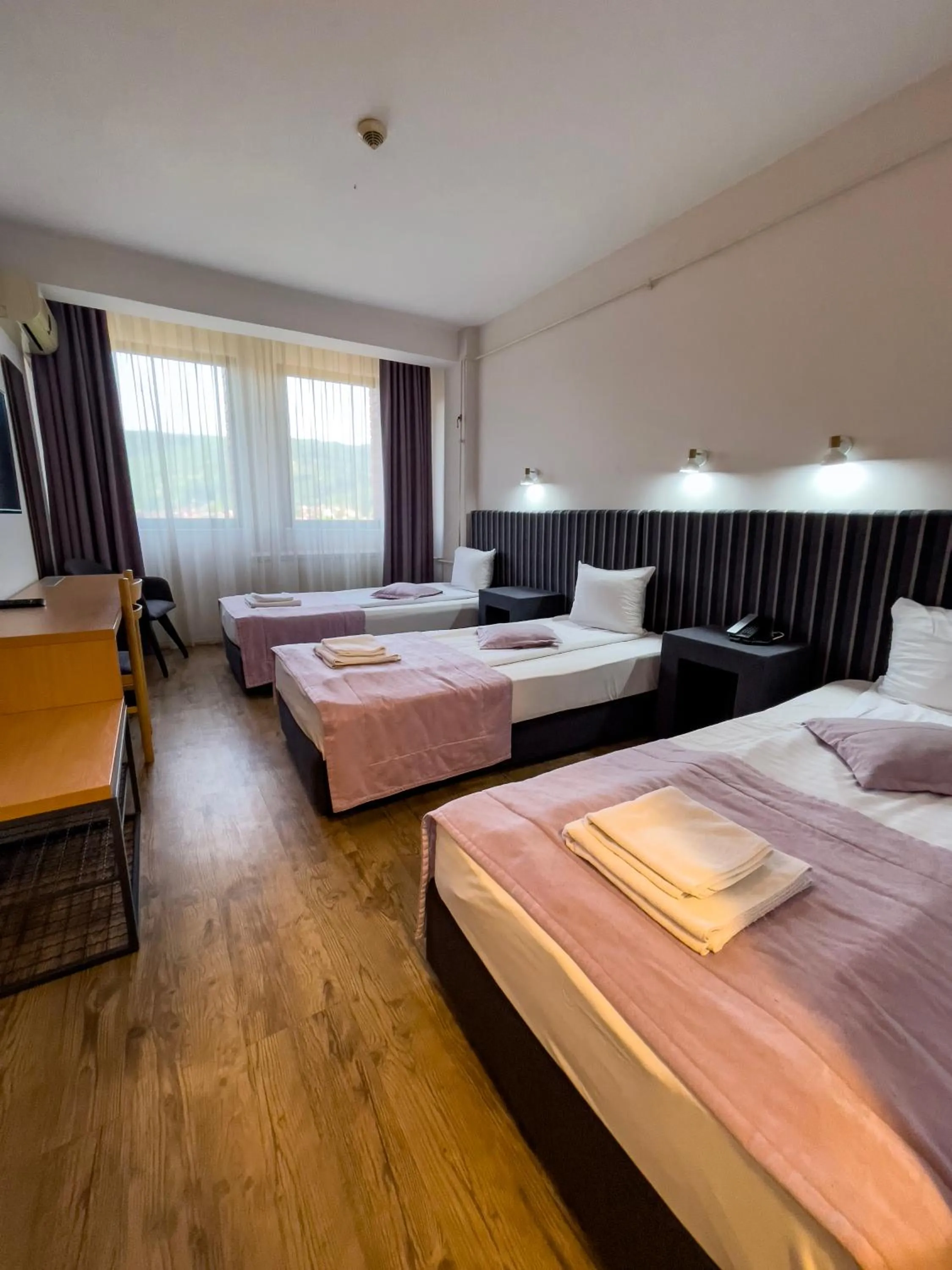 Bed in Zepter Hotel Drina Bajina Basta, member of Zepter Hotels