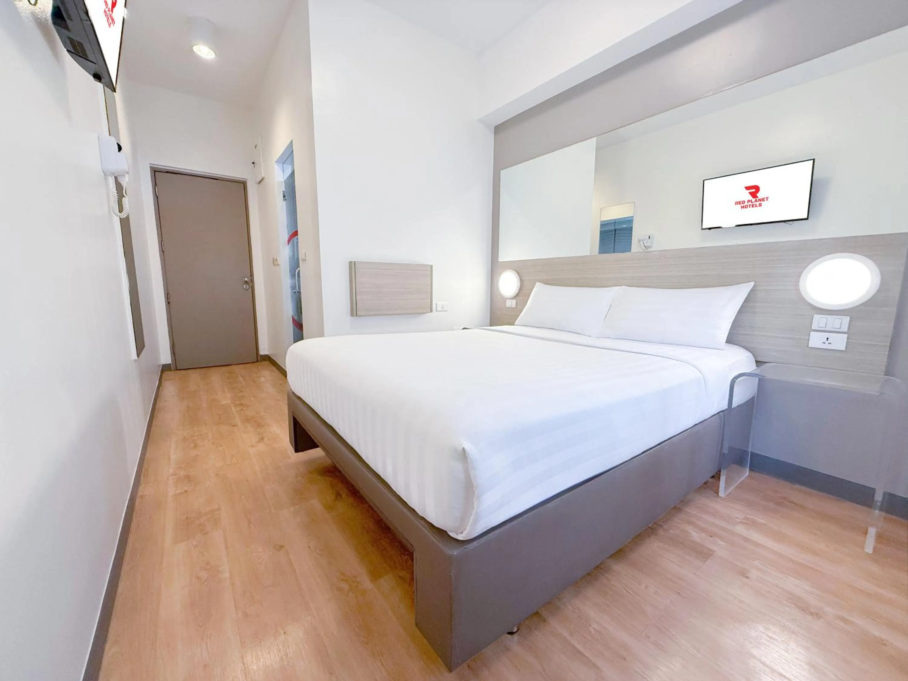 Bed in Red Planet Makati Amorsolo