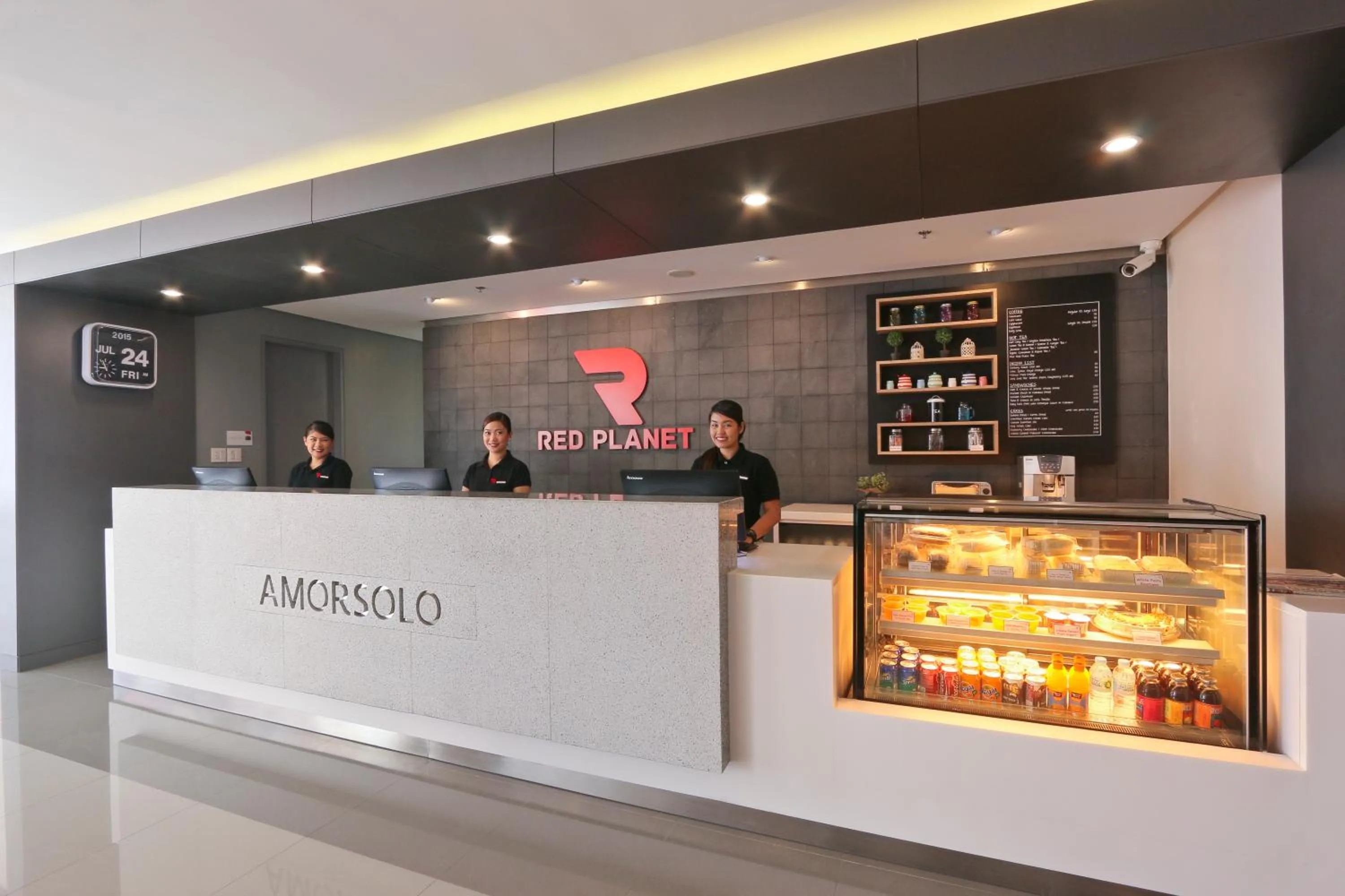 Staff in Red Planet Makati Amorsolo