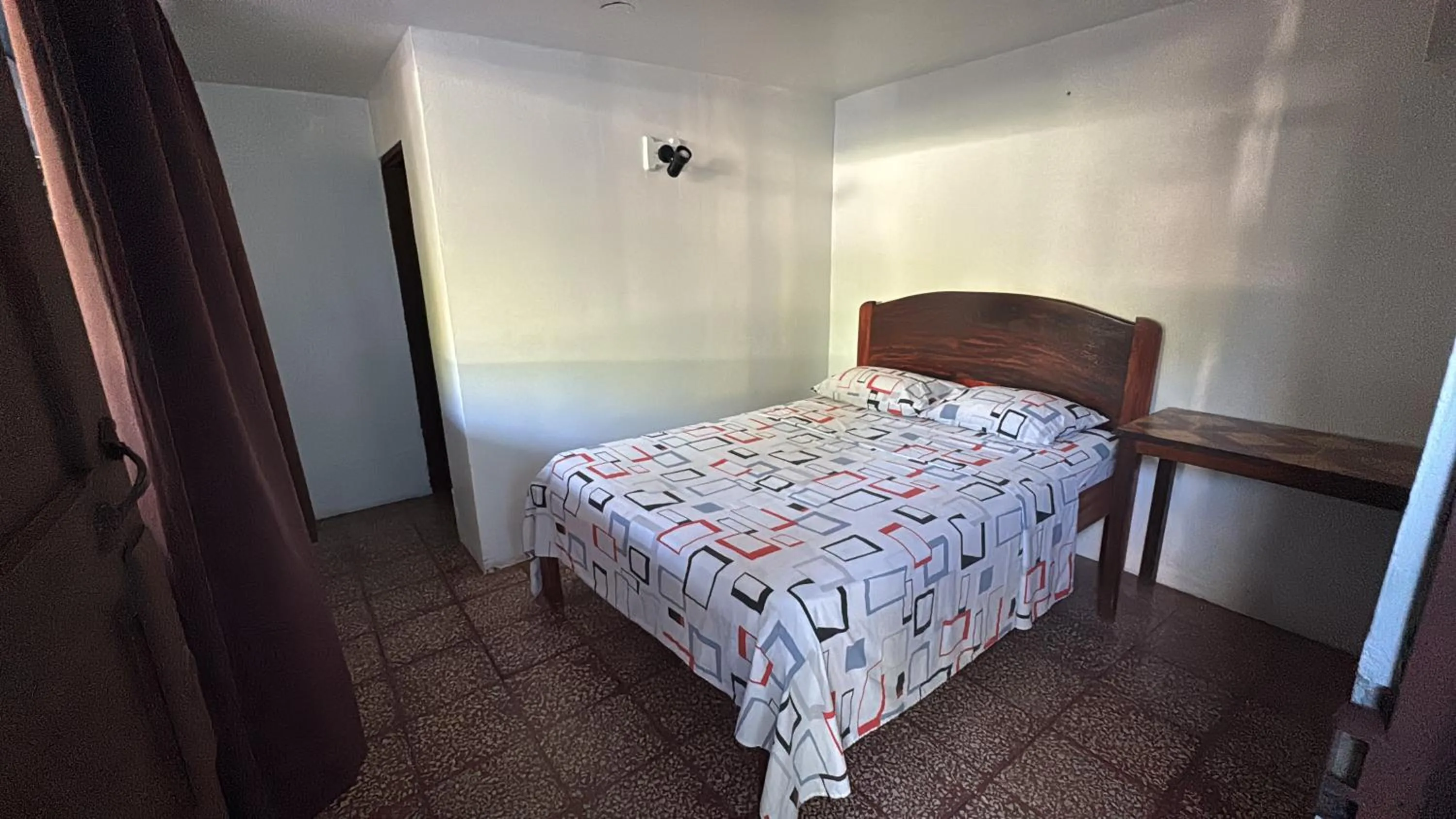 Bed in Hotel Marielos Tamarindo