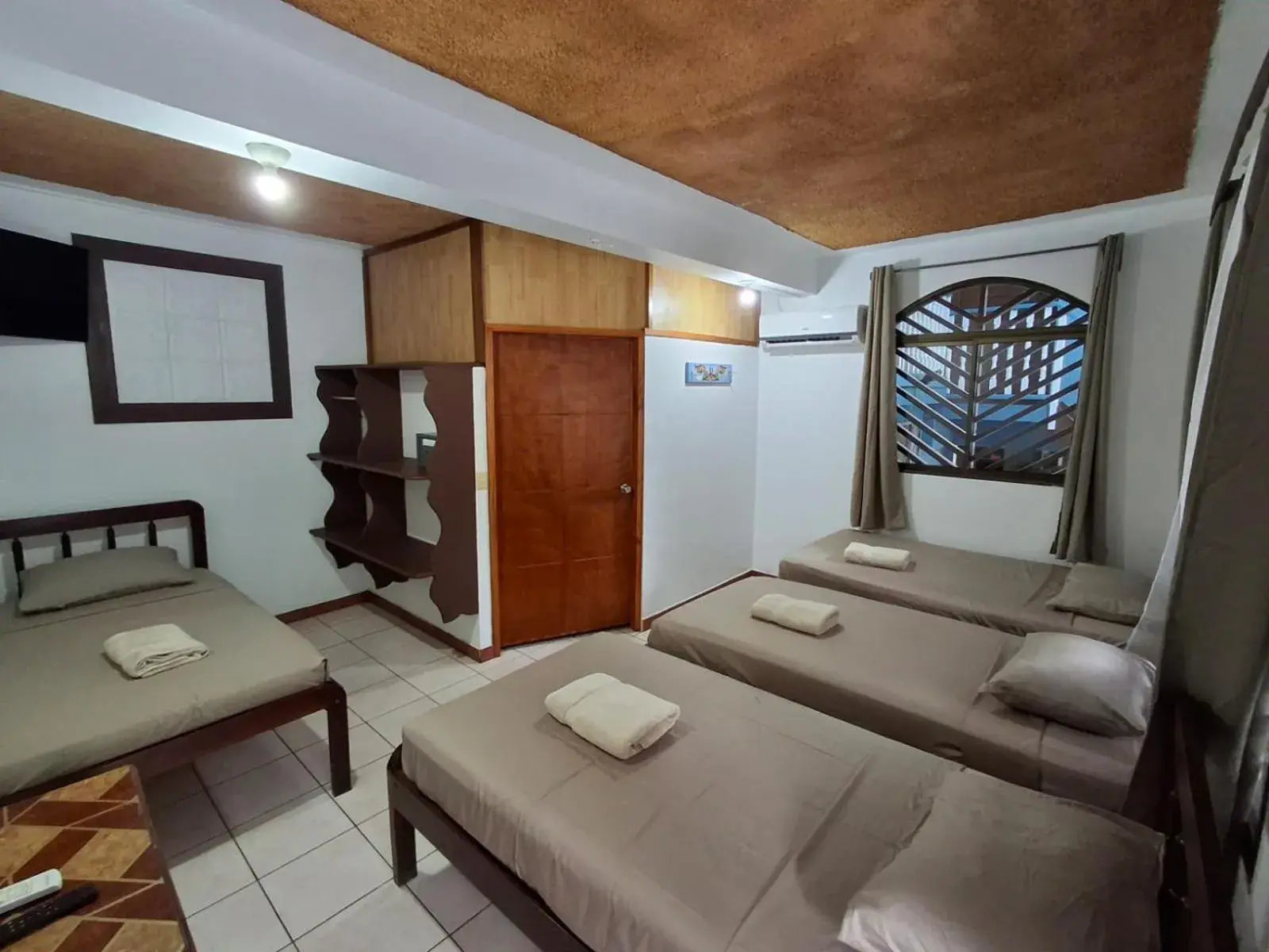 Quadruple Room (A/C, TV, Private Bathroom with Hot Water) in Hotel Marielos Tamarindo Quadruple Room (A/C, TV, Private Bathroom with Hot Water) in Hotel Marielos Tamarindo