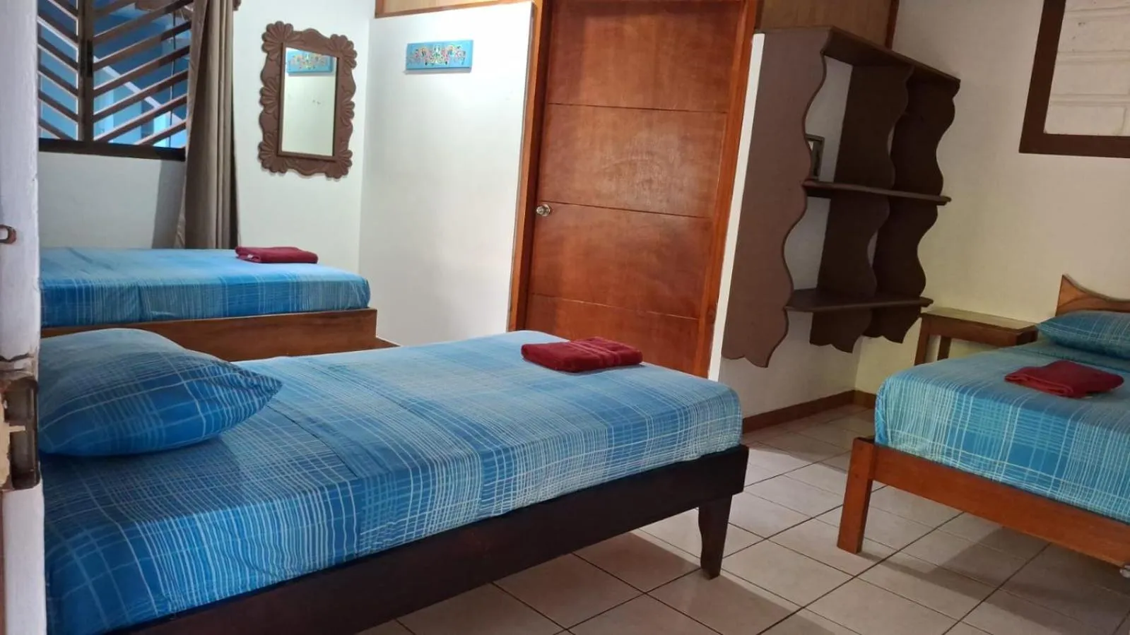 Bed in Hotel Marielos Tamarindo