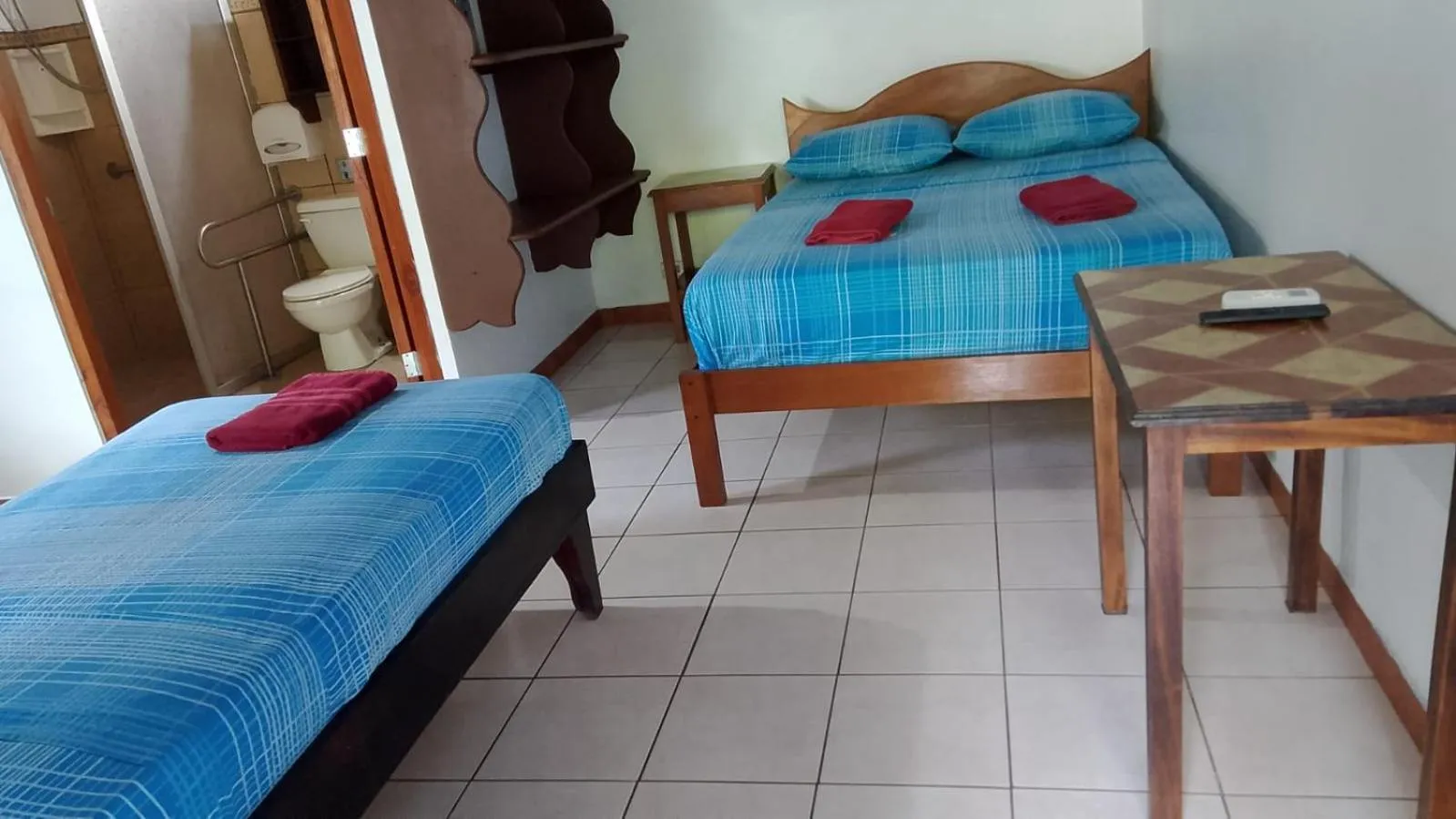 Bed in Hotel Marielos Tamarindo