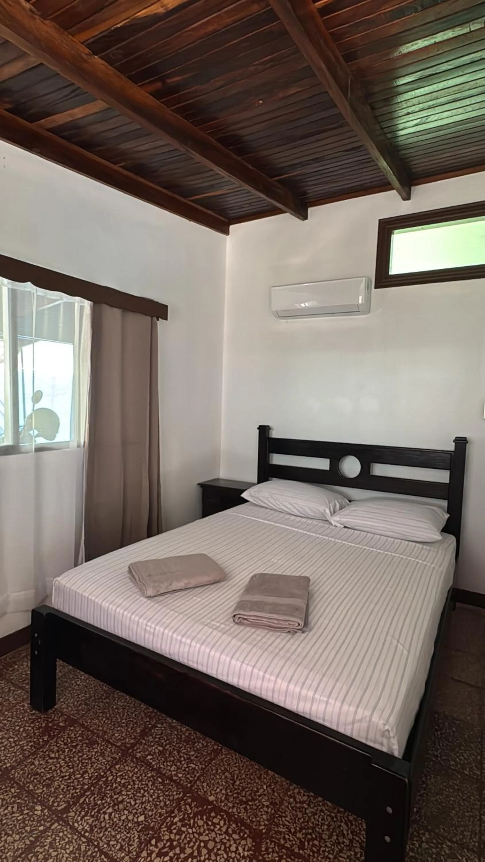 Bed in Hotel Marielos Tamarindo