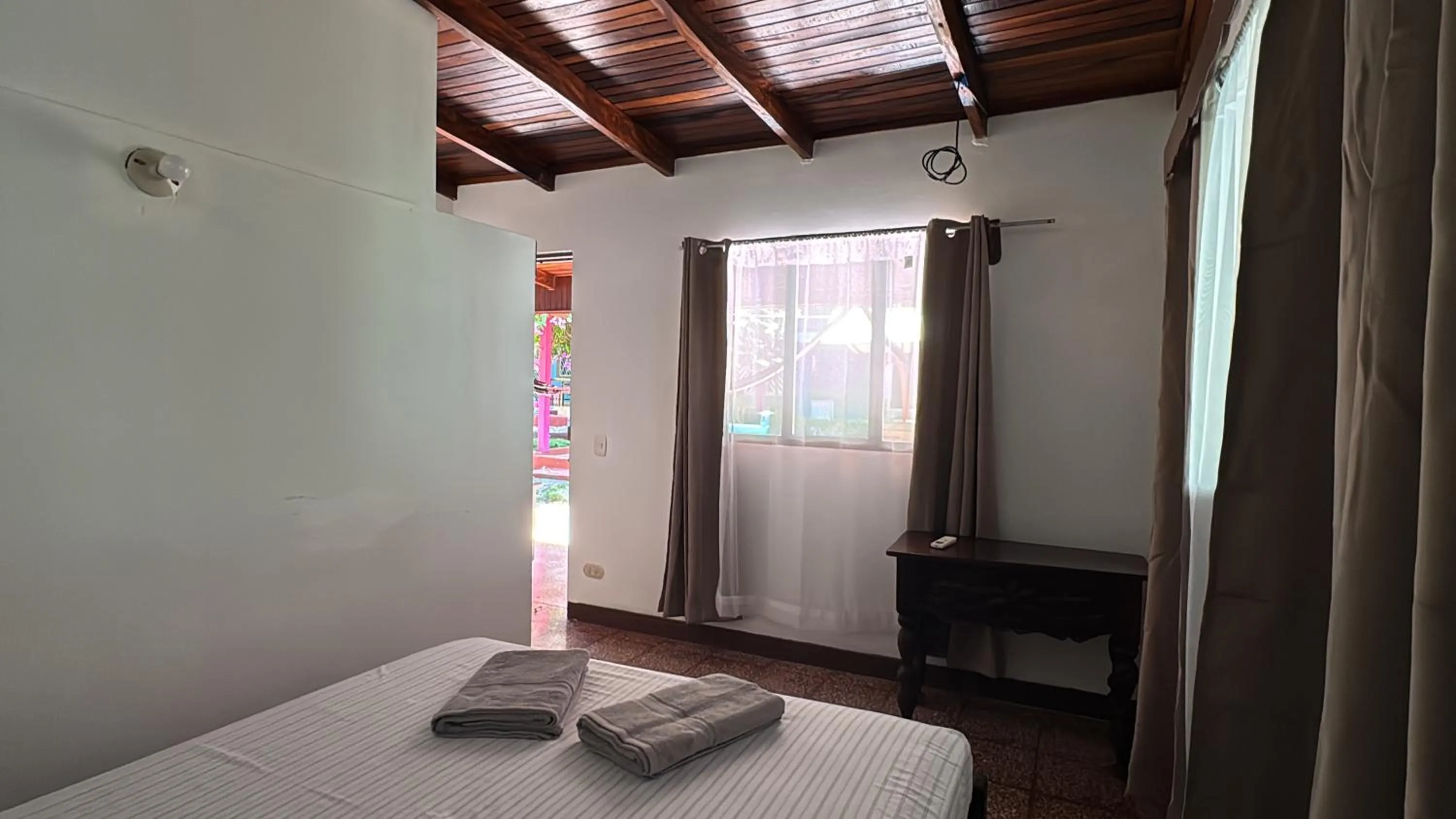 Bed in Hotel Marielos Tamarindo