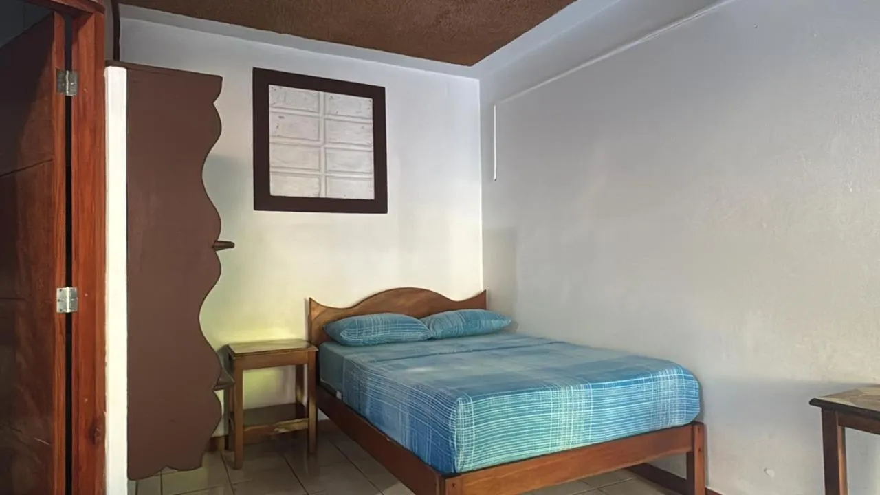 Bed in Hotel Marielos Tamarindo