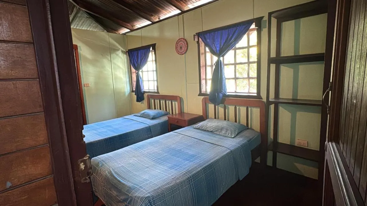 Bed in Hotel Marielos Tamarindo
