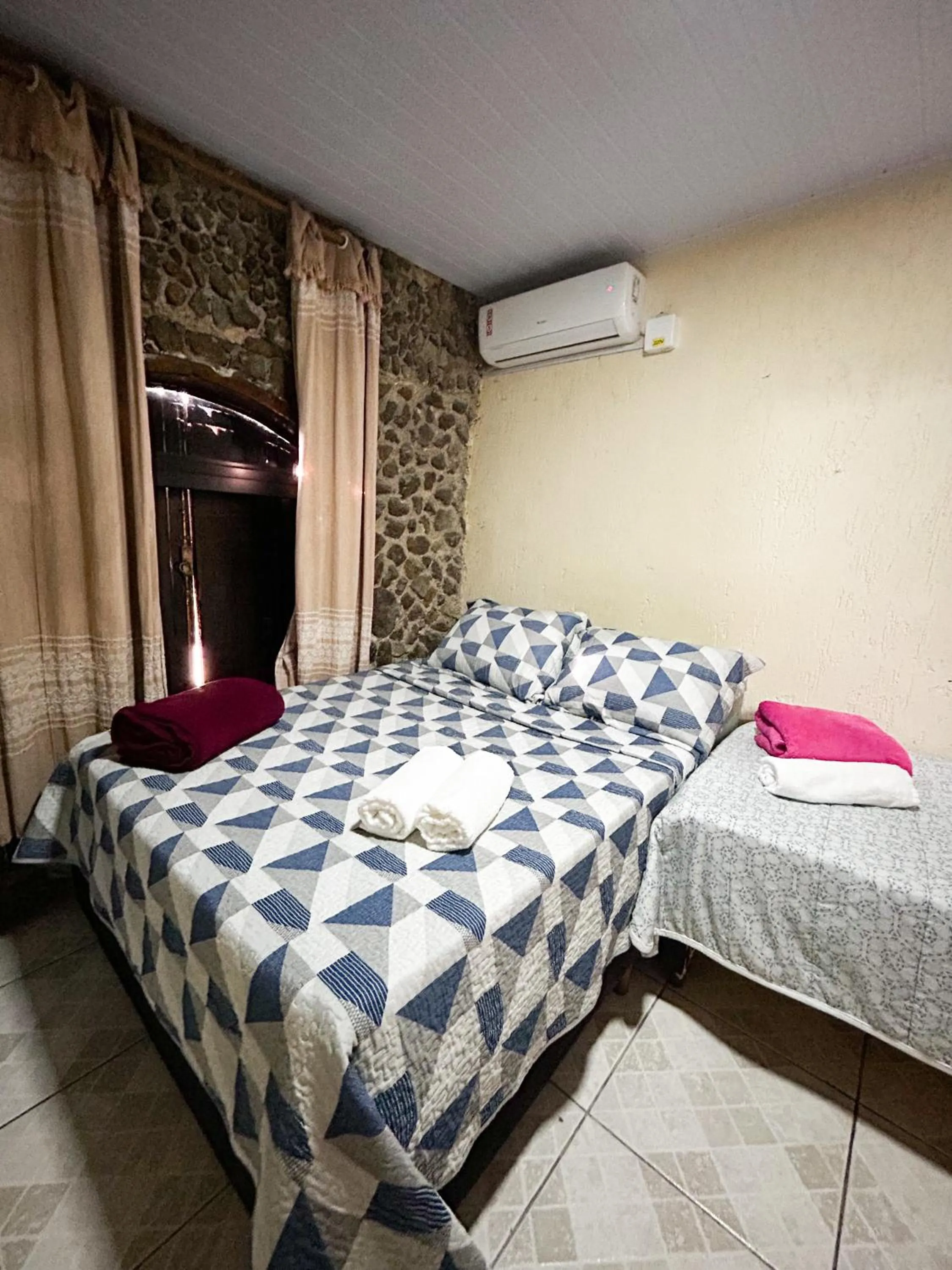 Bed in Pousada Toca da Ilha