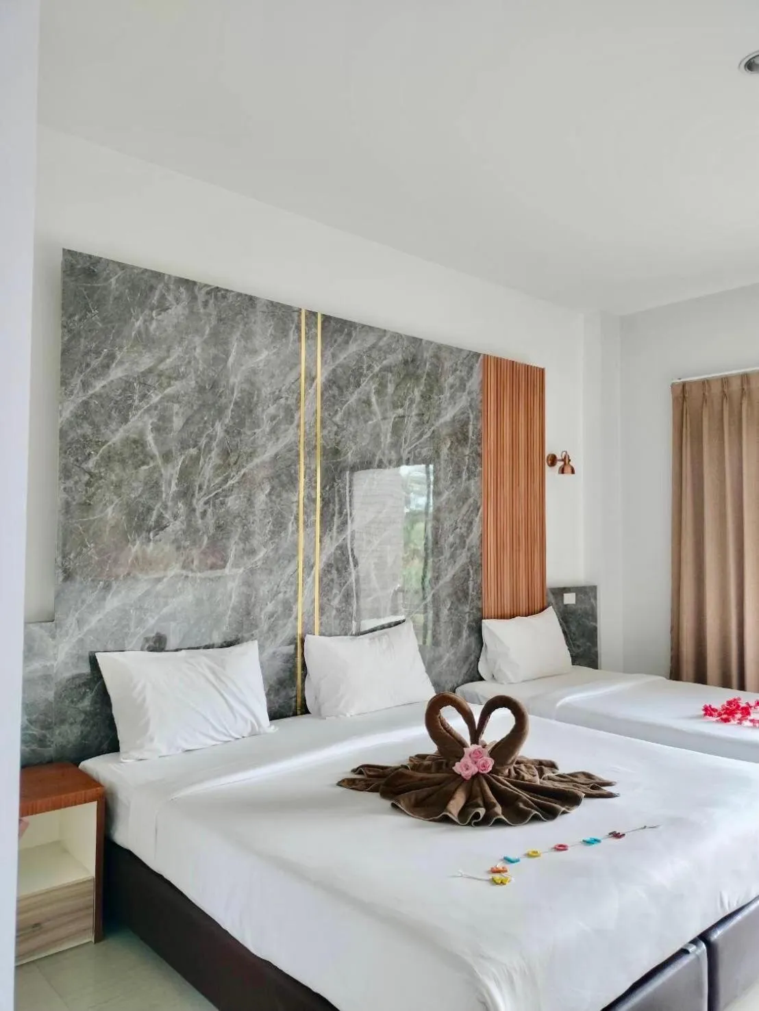 Bed in Rimnatee Resort Trang