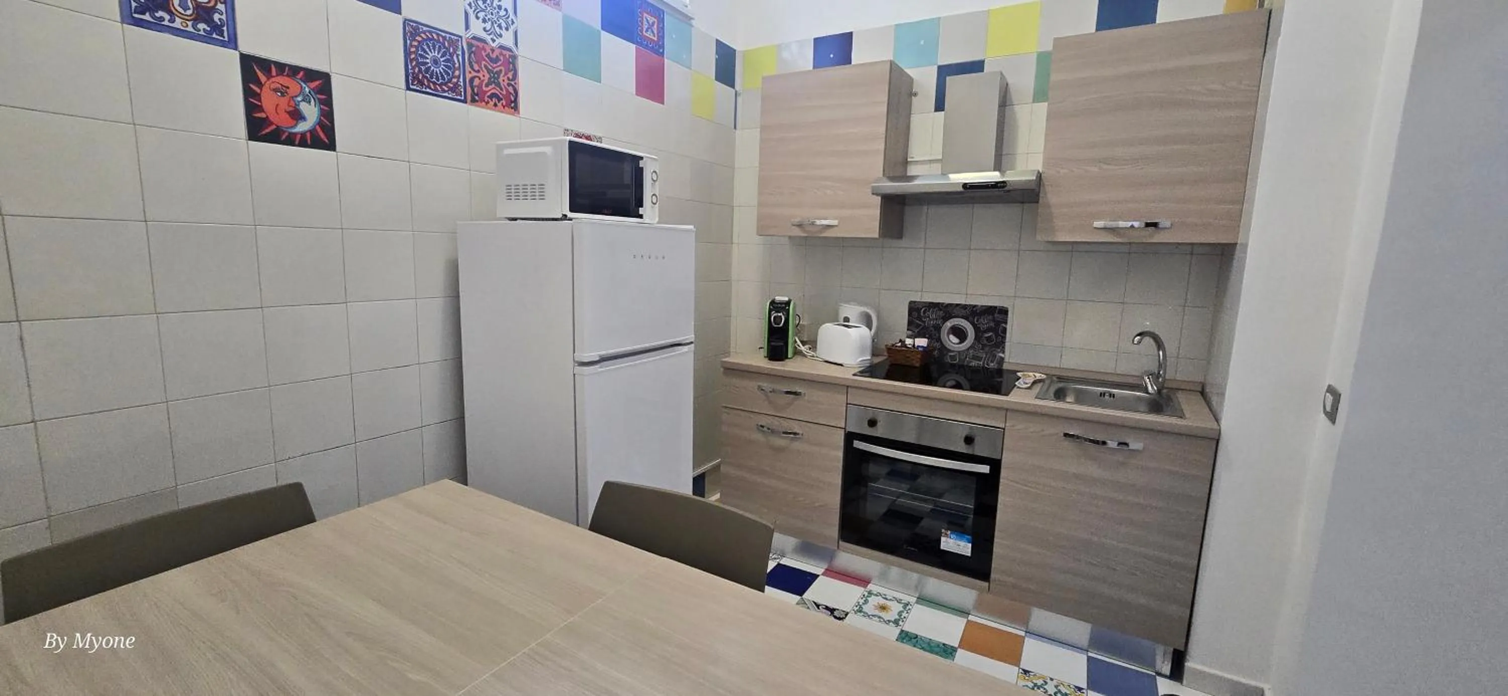 Kitchen or kitchenette in Appartamenti La Dimora di Parthenope Centro Storico