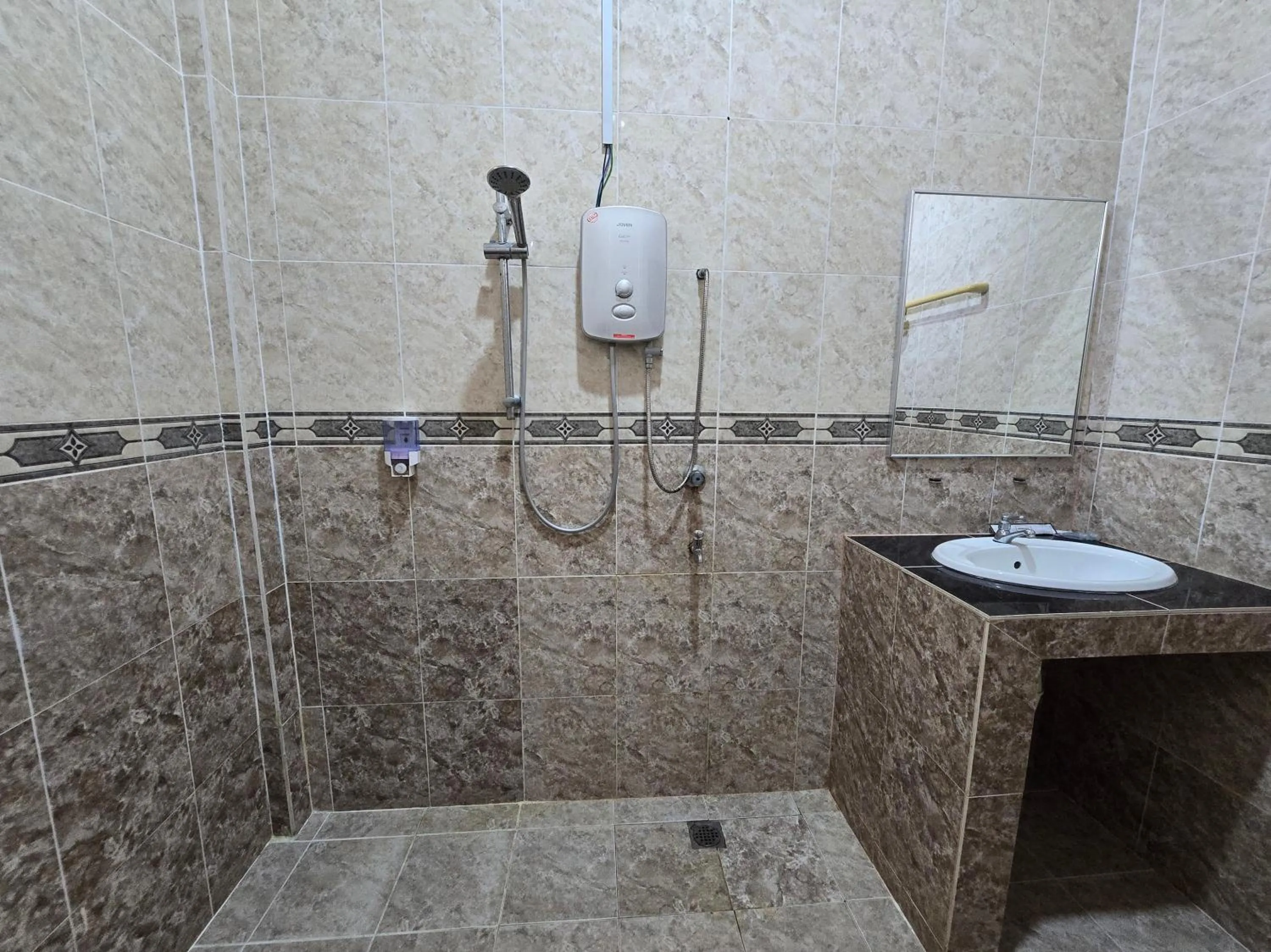 Bathroom in Hotel O Villa Impiana