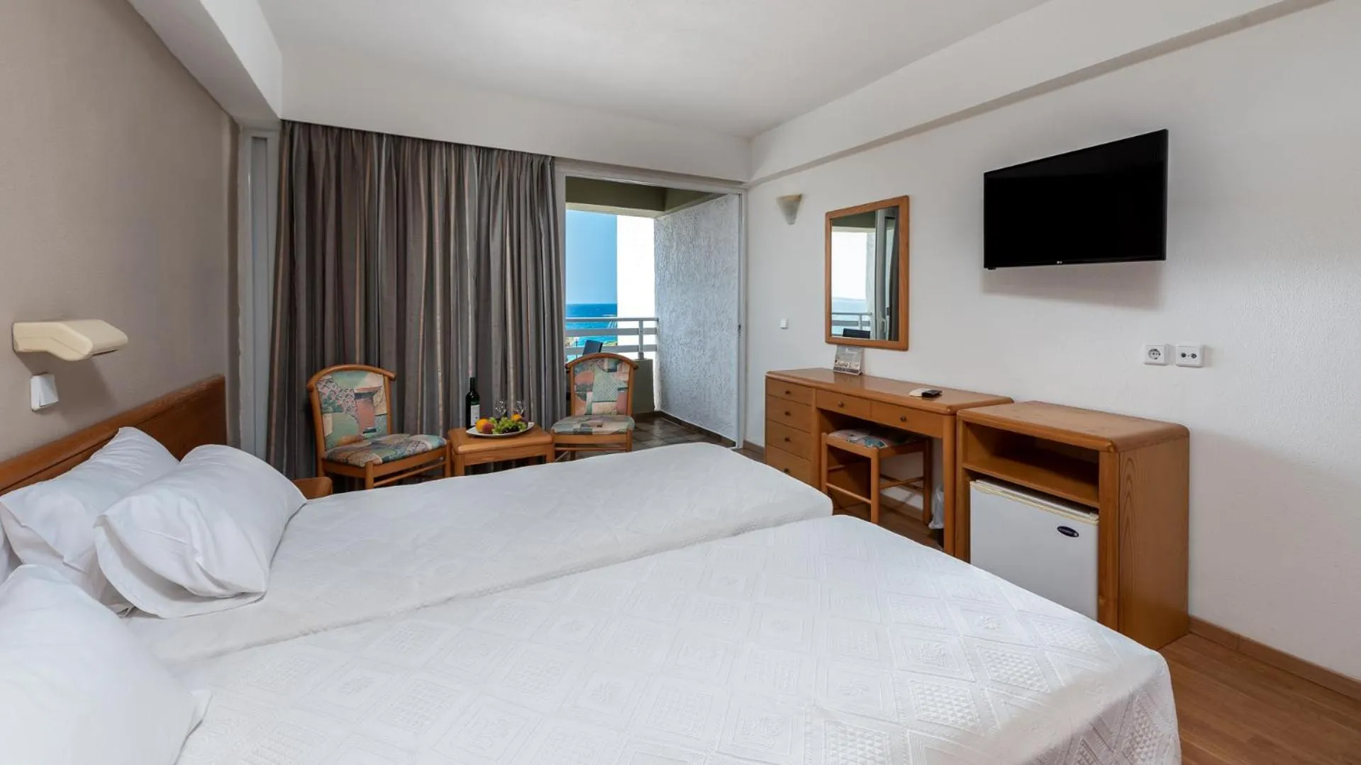 Bed in Sirene Beach Hotel