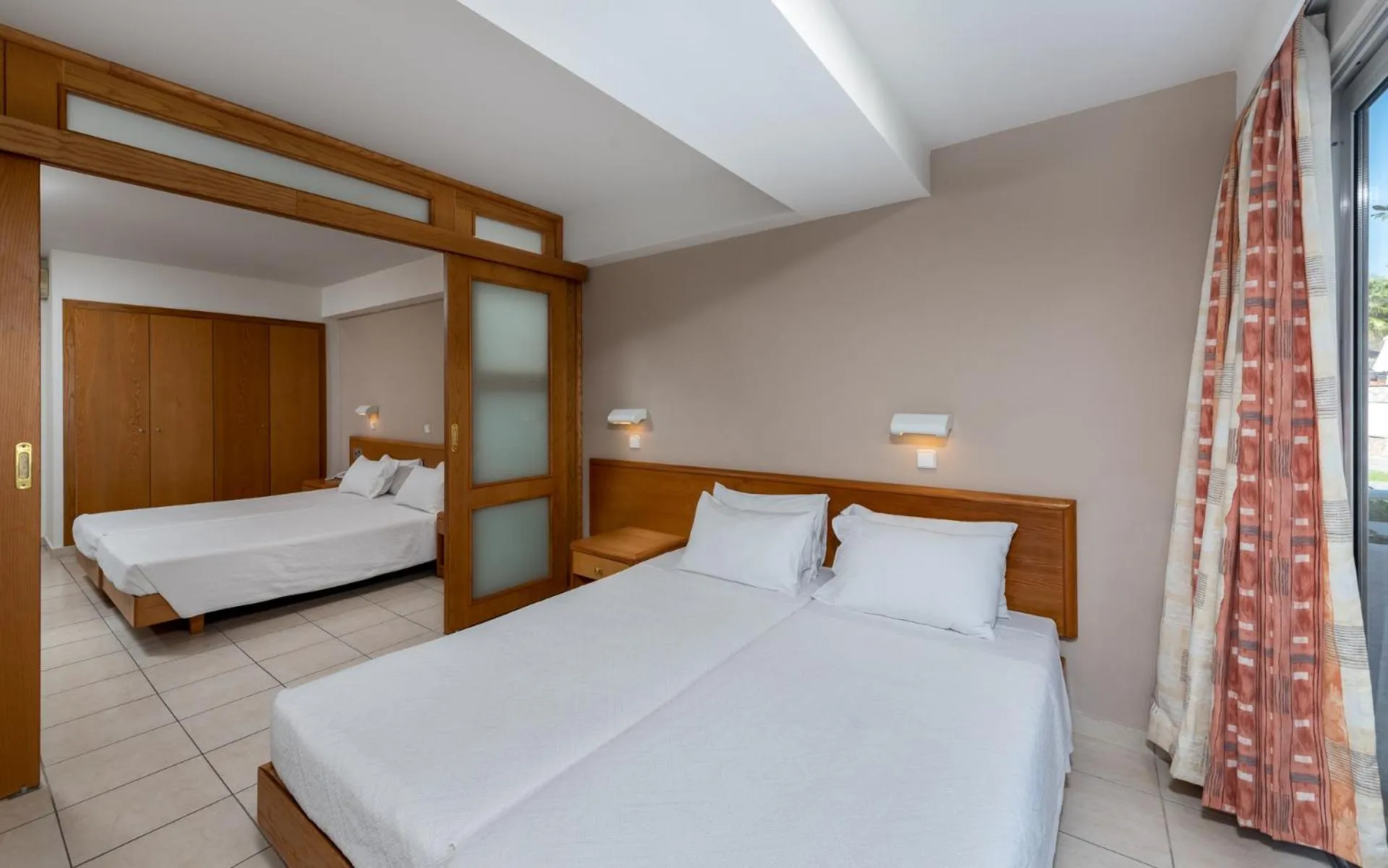 Bed in Sirene Beach Hotel