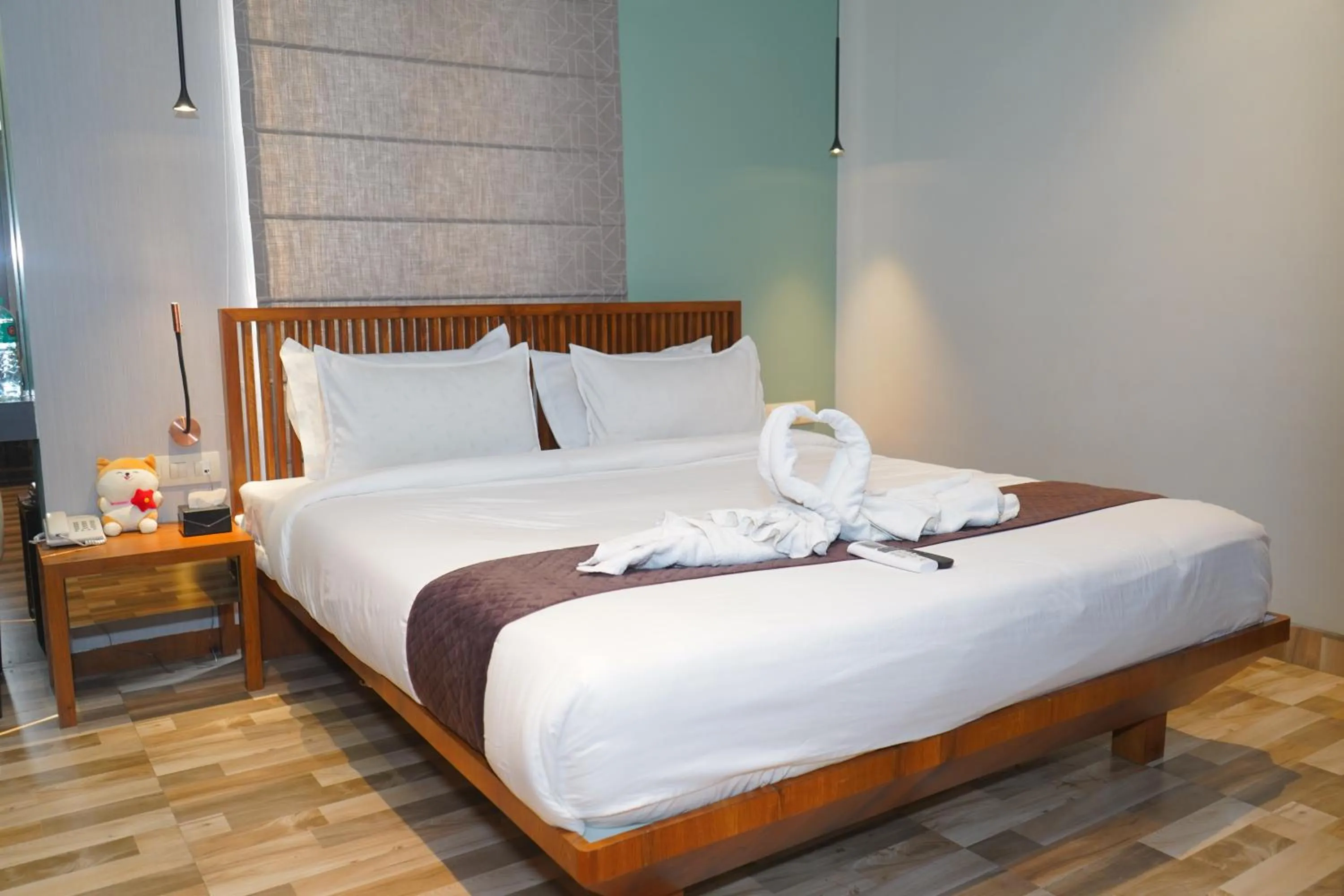 Bed in Abssolute Homtel - Rooms & Suites
