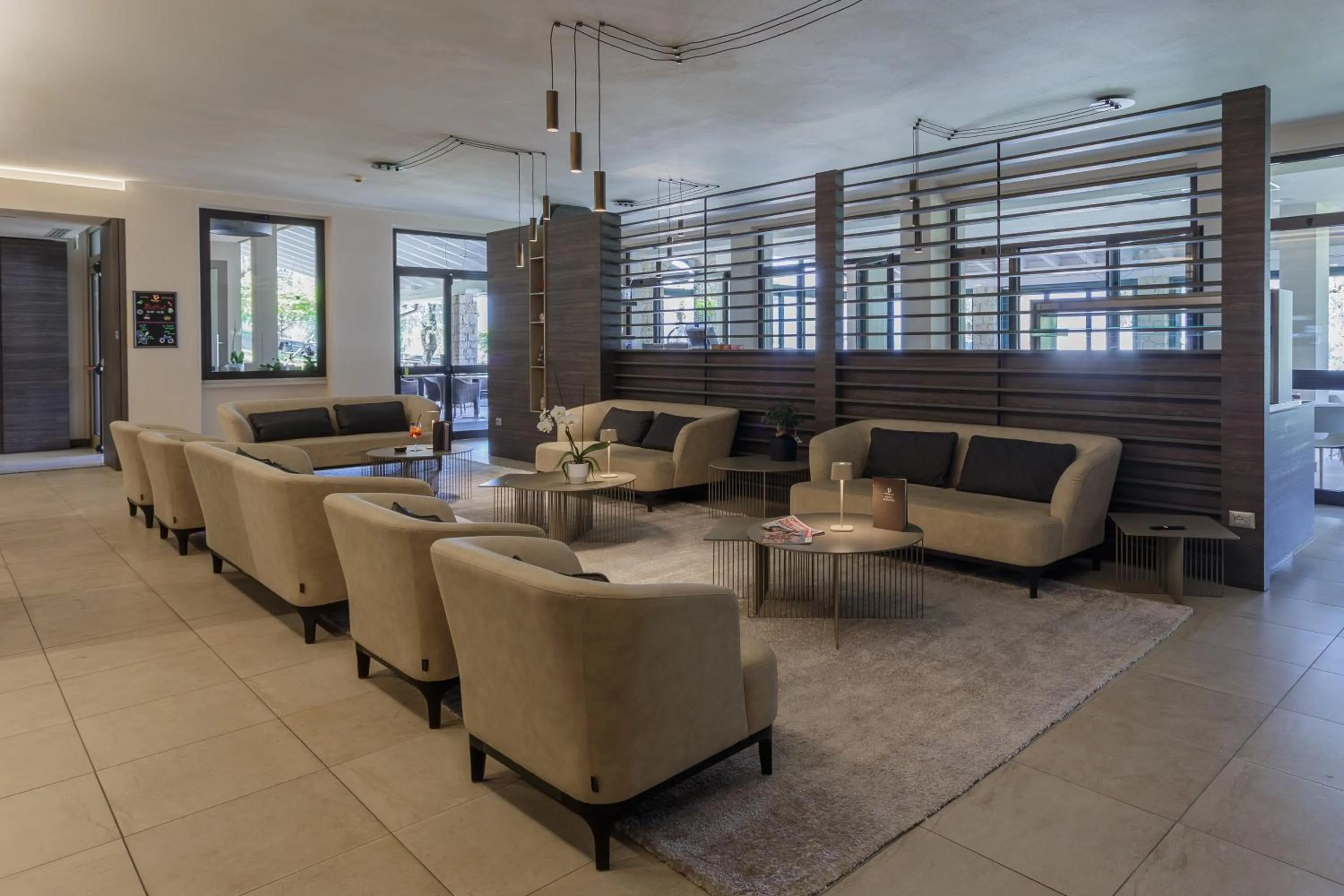 Communal lounge/ TV room in Hotel Veronesi