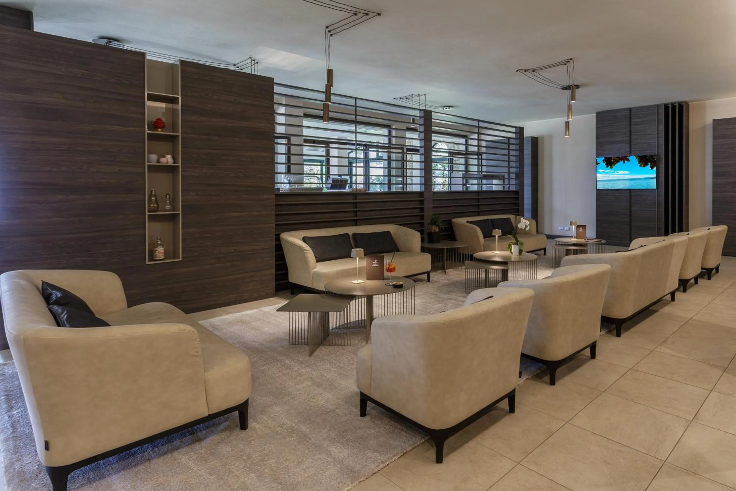 Communal lounge/ TV room in Hotel Veronesi