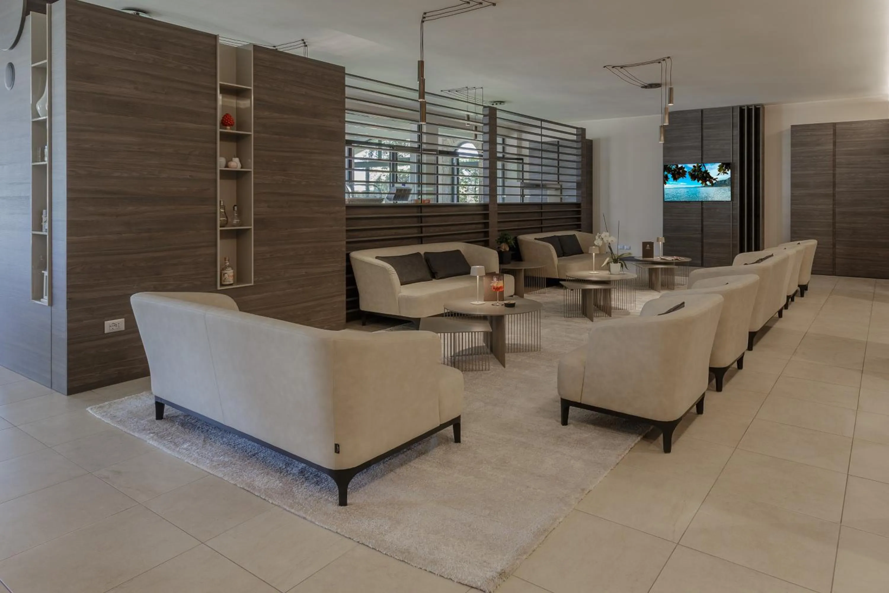 Communal lounge/ TV room in Hotel Veronesi