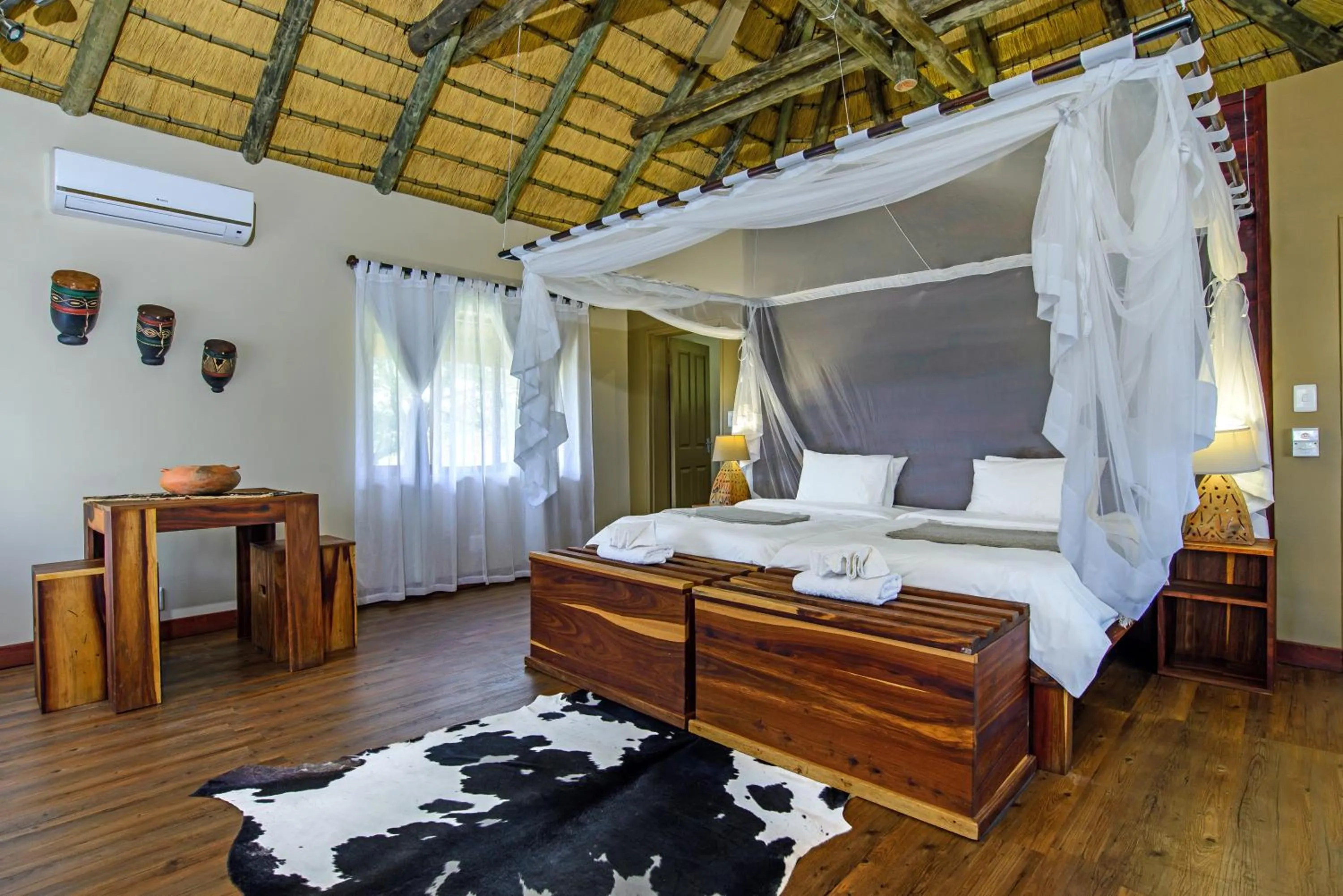 Bed in Gondwana Hakusembe River Lodge