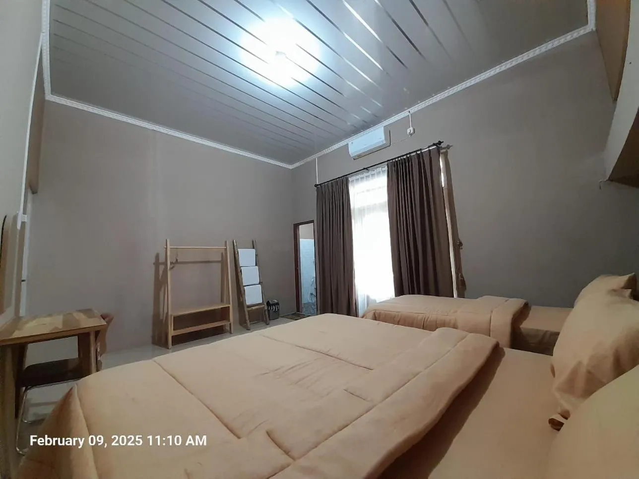 Bed in Griya Al Mukmin Guesthouse Syariah