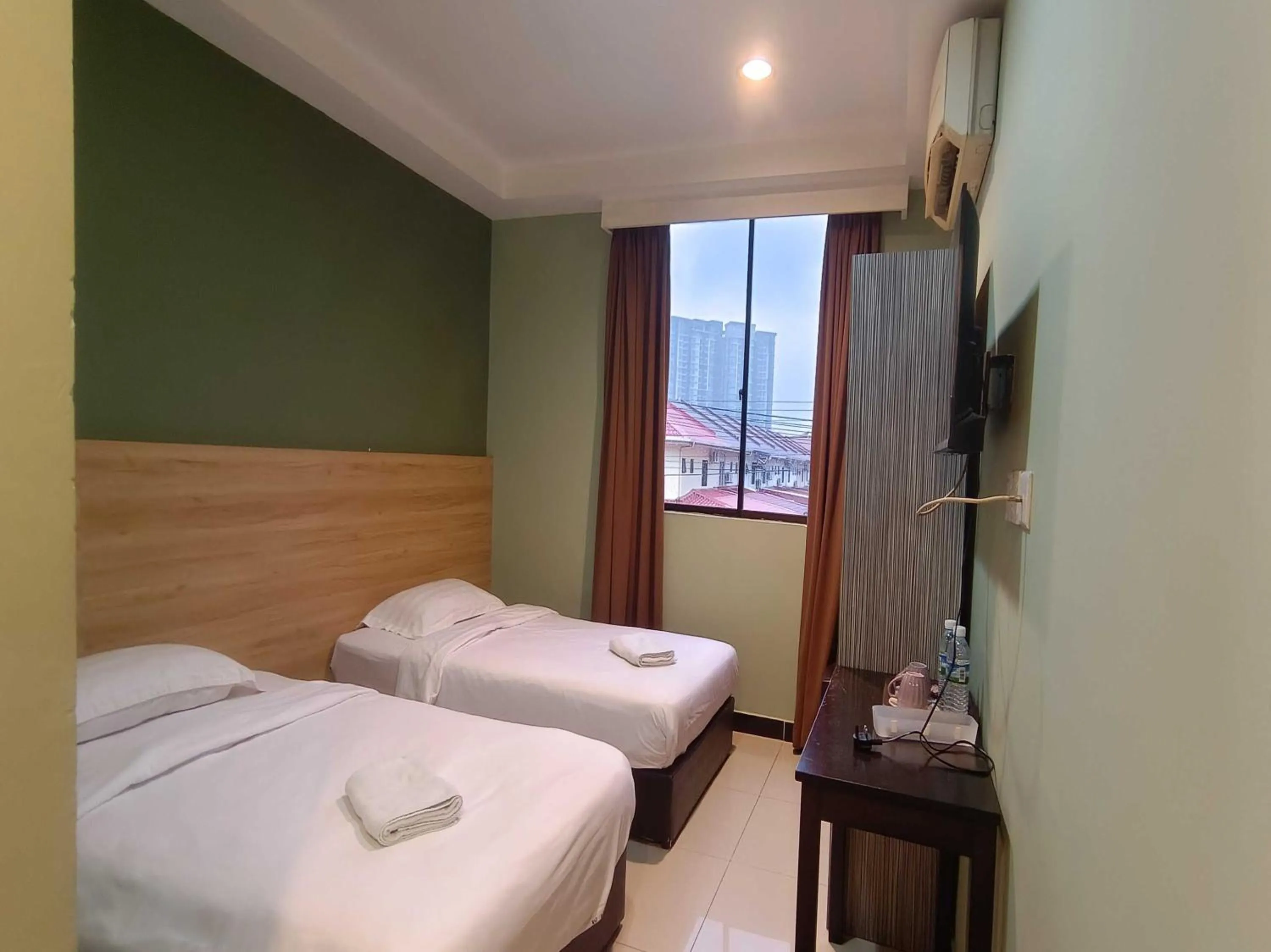 Bedroom, Bed in Hotel O Rainfield Inn