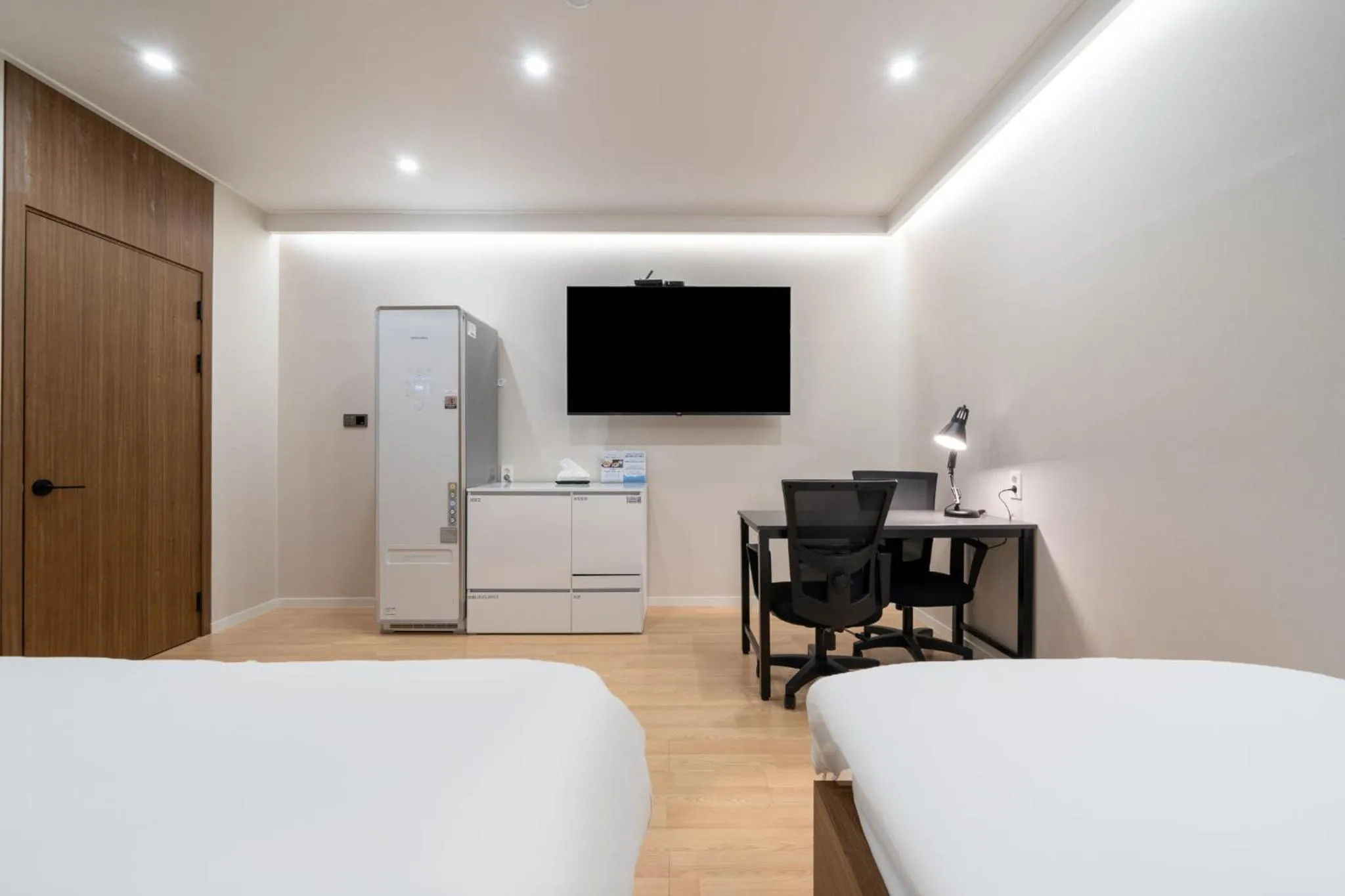 Seating area, Bed in GOYU Hotel
