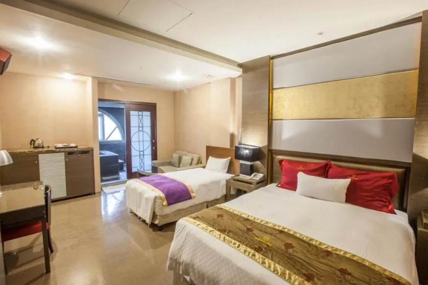 Bed in Spring Breeze Hotel