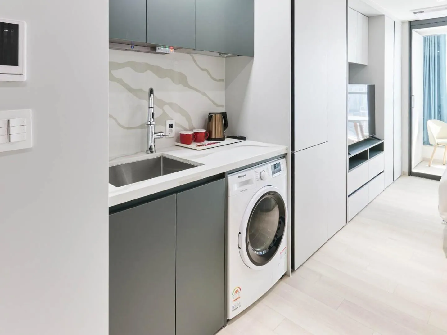 washing machine in NewCZ Centum Hotel