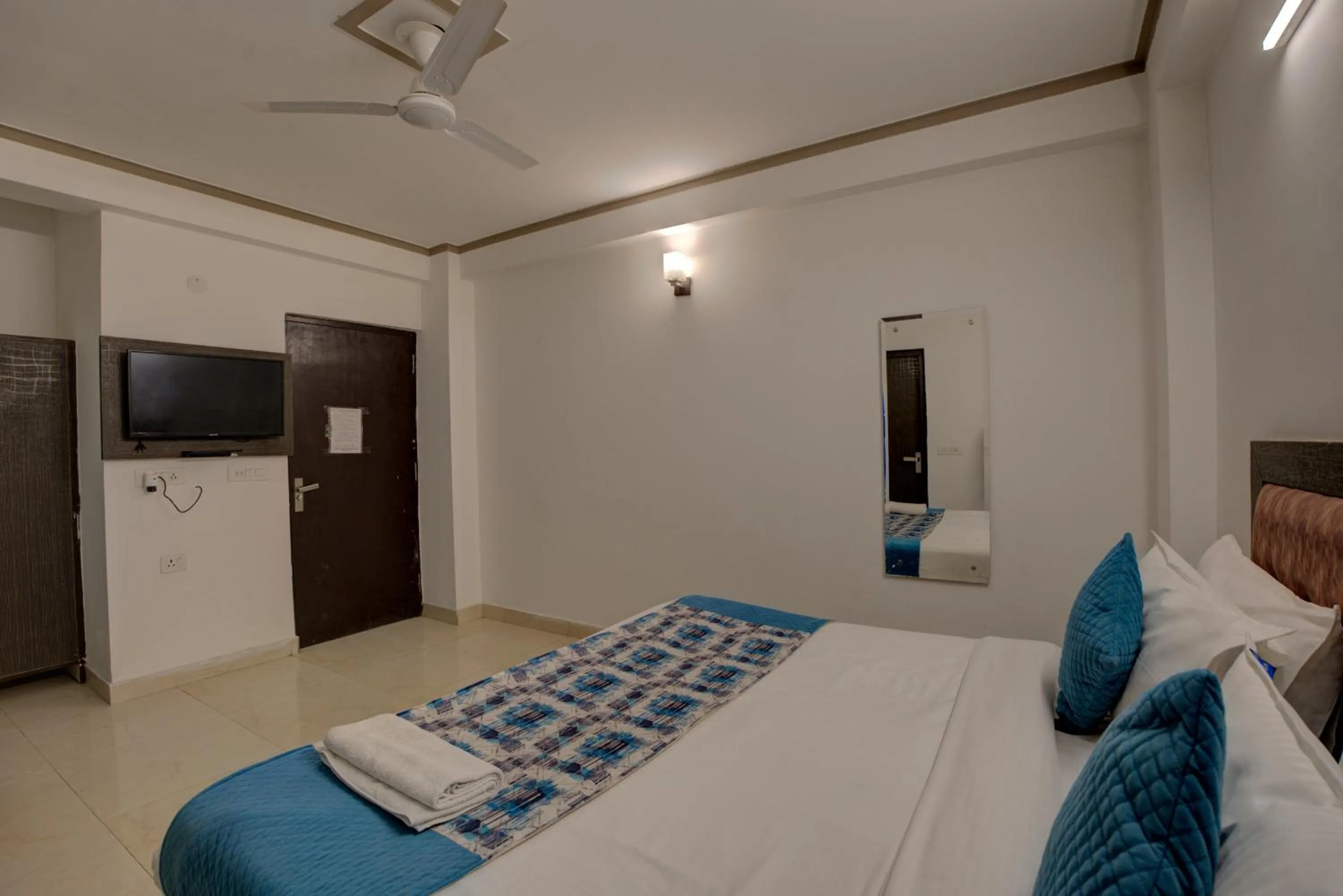 Bed in Hotel Dolphin at Delhi Airport