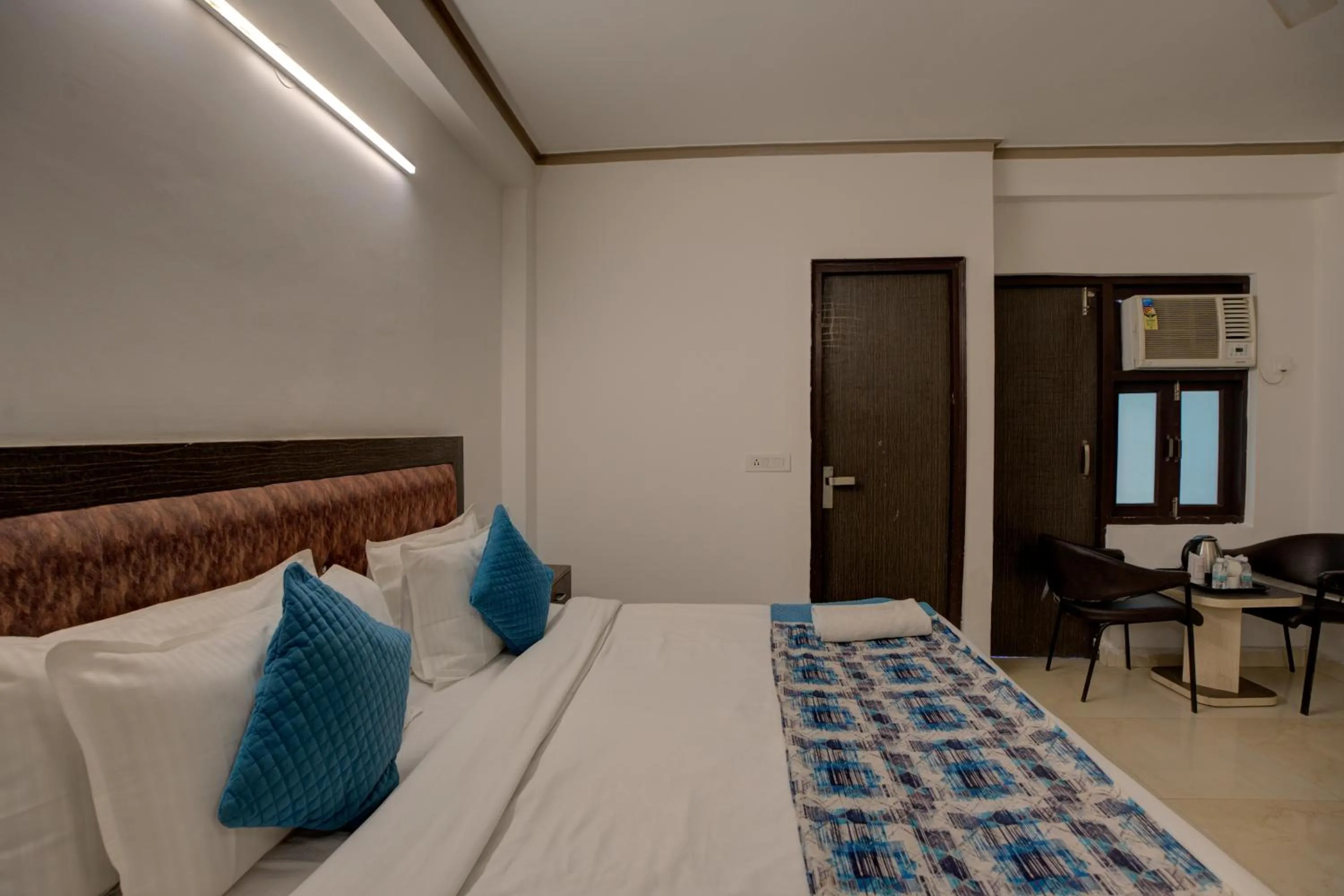 Bed in Hotel Dolphin at Delhi Airport